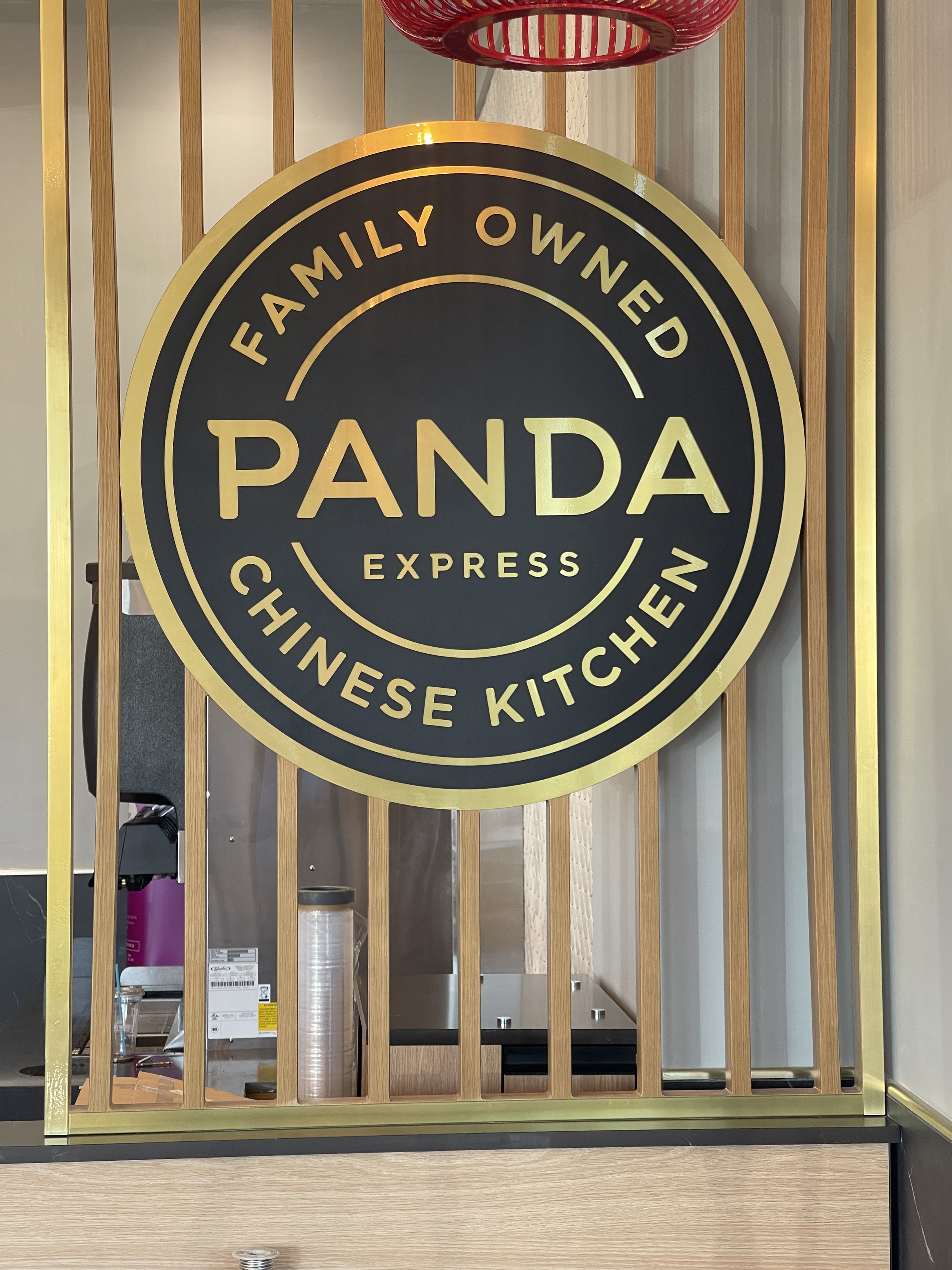 Sign for Panda Express Chinese kitchen, indicating the location is family owned. Wallpaper instalating in Charlotte and near