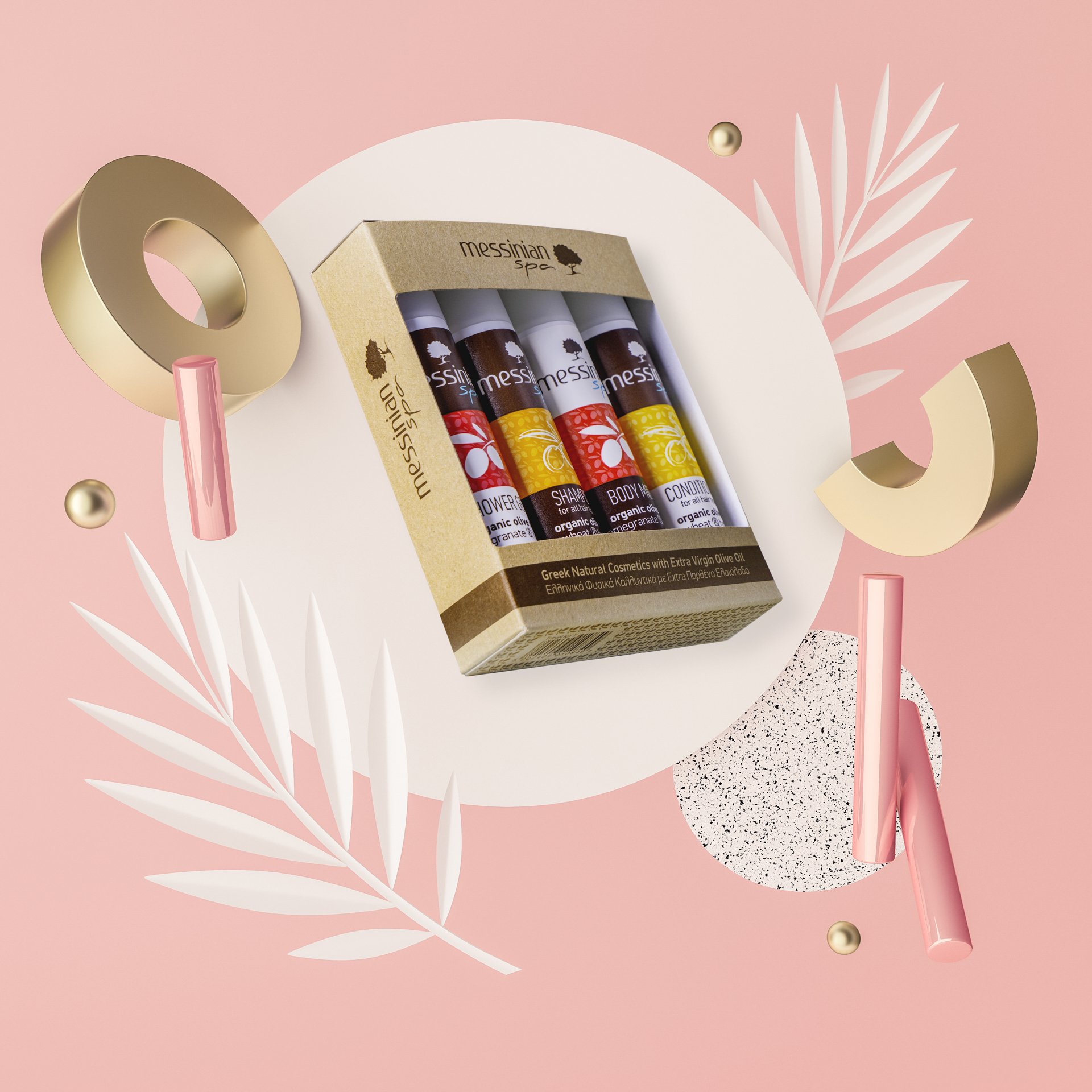 Set of four Greek natural cosmetic products in a cardboard box, including shampoo, body oil, conditioner, and soap, on a pastel pink background with decorative gold and pink geometric shapes and white foliage design.