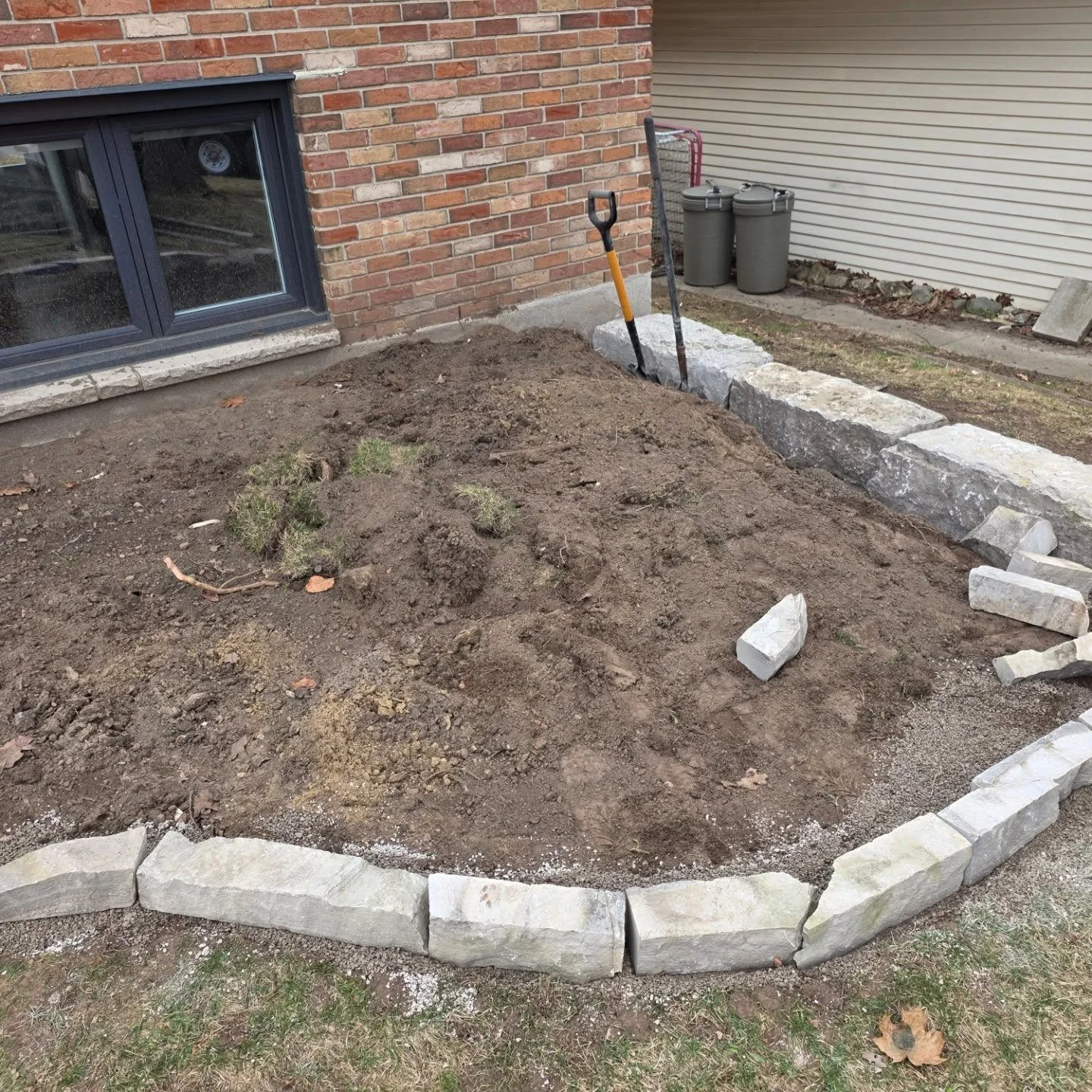 Got a little armorstone and ledgerock in this afternoon in byron to beat the upcoming rain. Plants and mulch coming soon. #byronontario #armorstone #gardeninstall #ledgerock #mulch