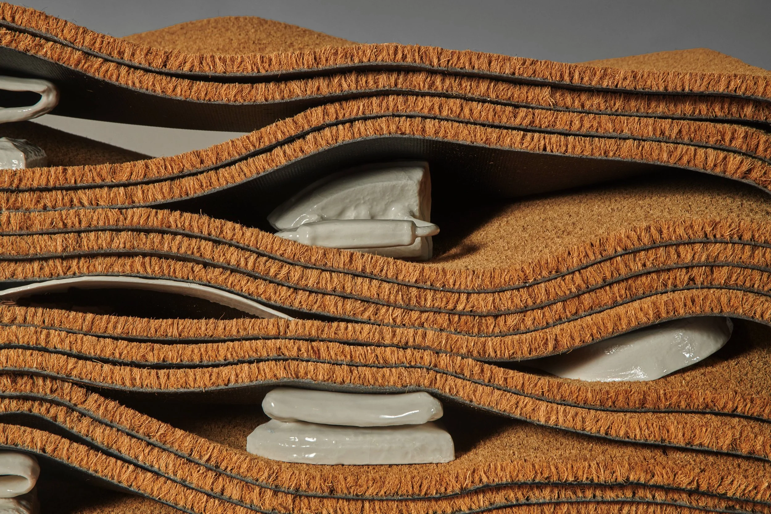LaRissa Rogers
Detail  A stratigraphic threshold of broken inheritance , 2025
Door mats, cast porcelain family heirlooms
30 x 17 x 36 in | 76 x 43 x 91 cm