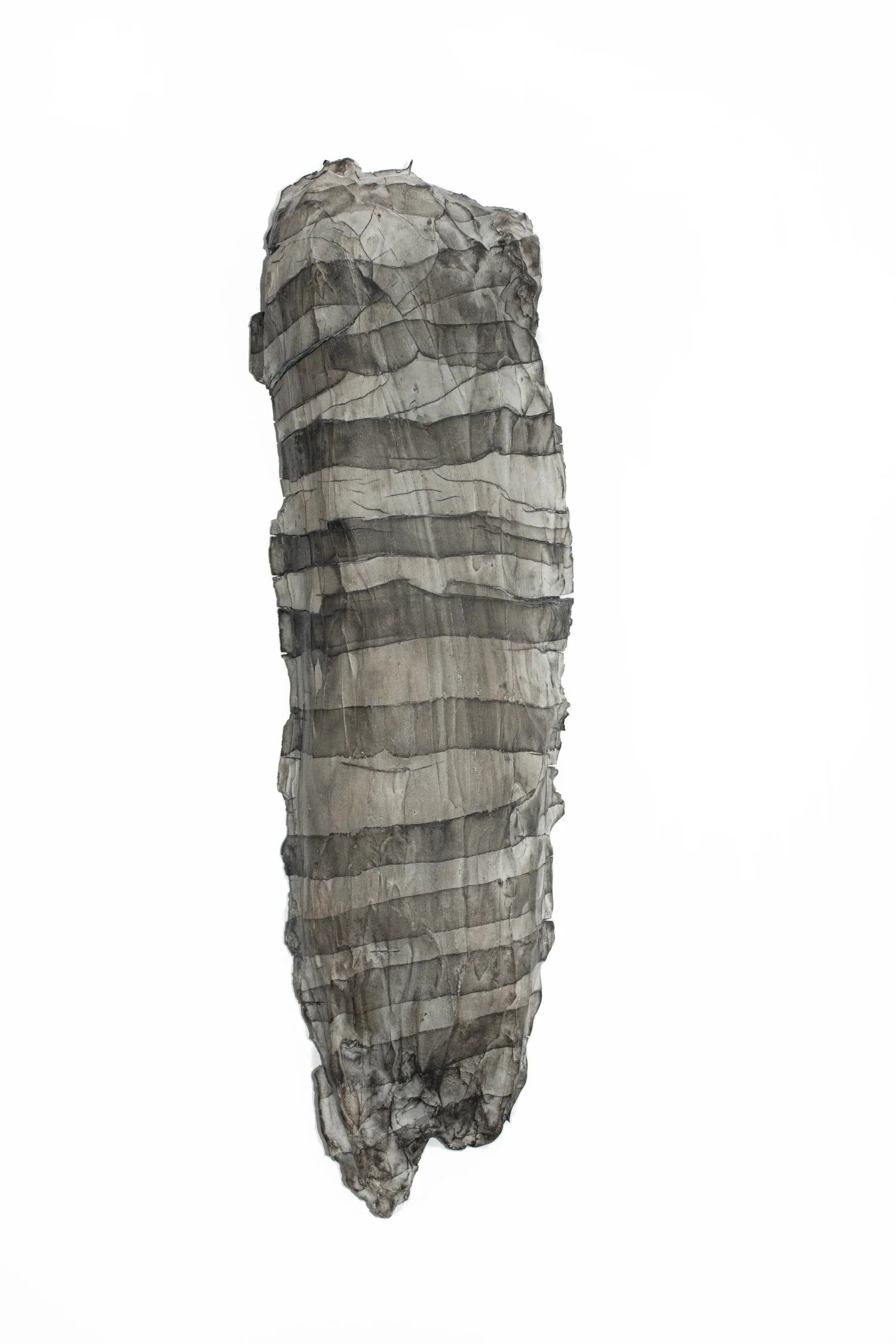  Fragment (Work Shirt) , 2018 
India ink on fired porcelain formed from fabric and wood 
19 x 5 1/4 x 2 3/4 in | 48 x 13 x 7 cm