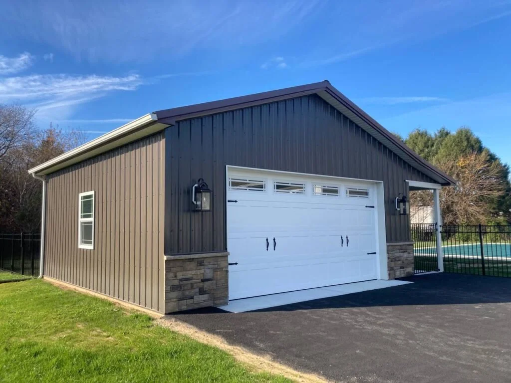 Metal-sided pole barn garage workshop building