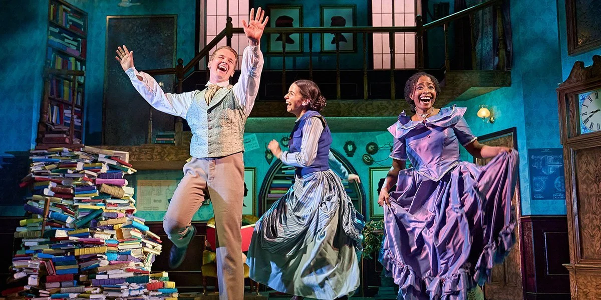 Actors mid-dance in Bleak Expectations, a lively moment that captures Act Productions’ playful approach to reimagining classic stories.