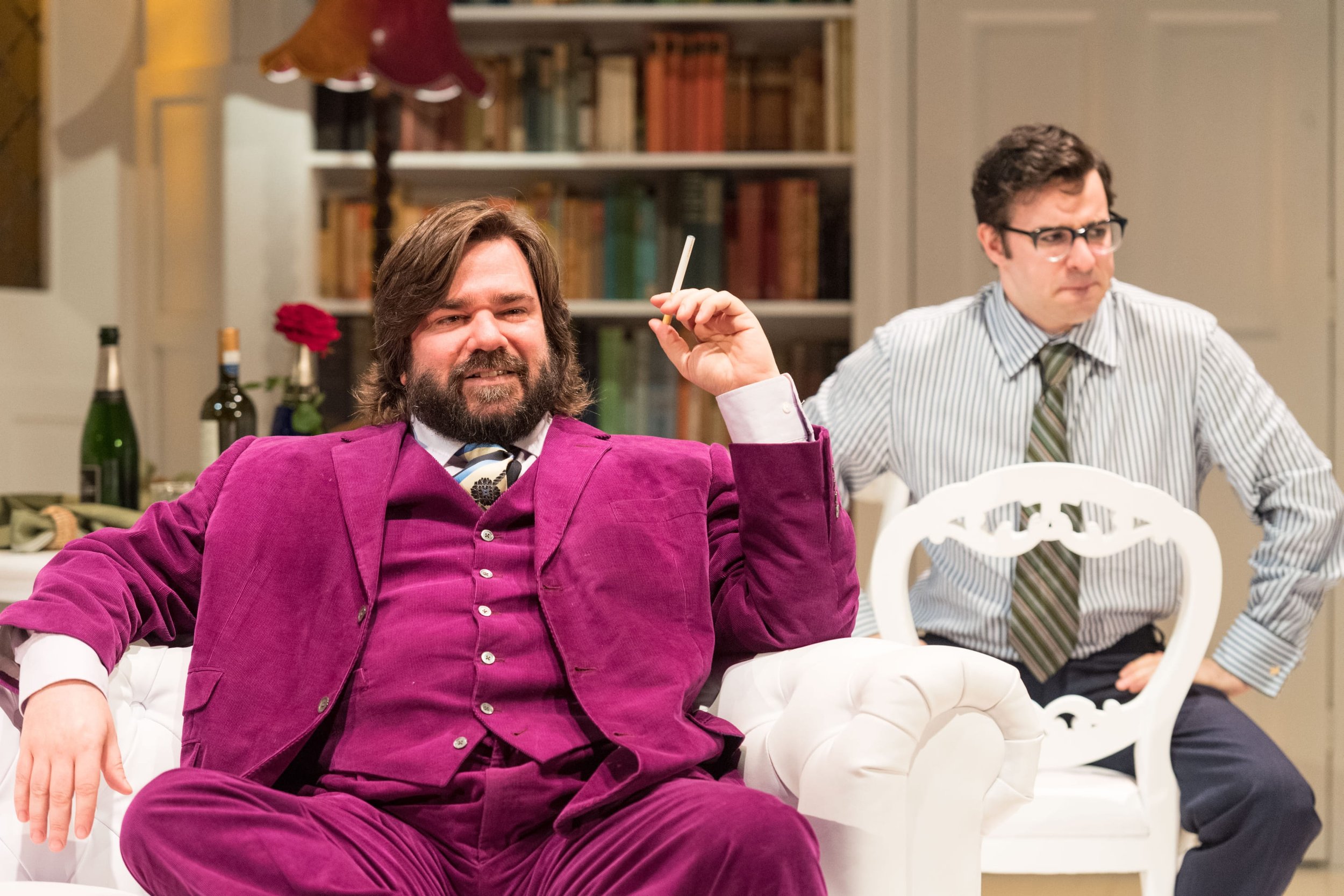 Actor smoking in The Philanthropist at Trafalgar Studios, a snapshot of wit, doubt, and the play’s sharp emotional undercurrent.