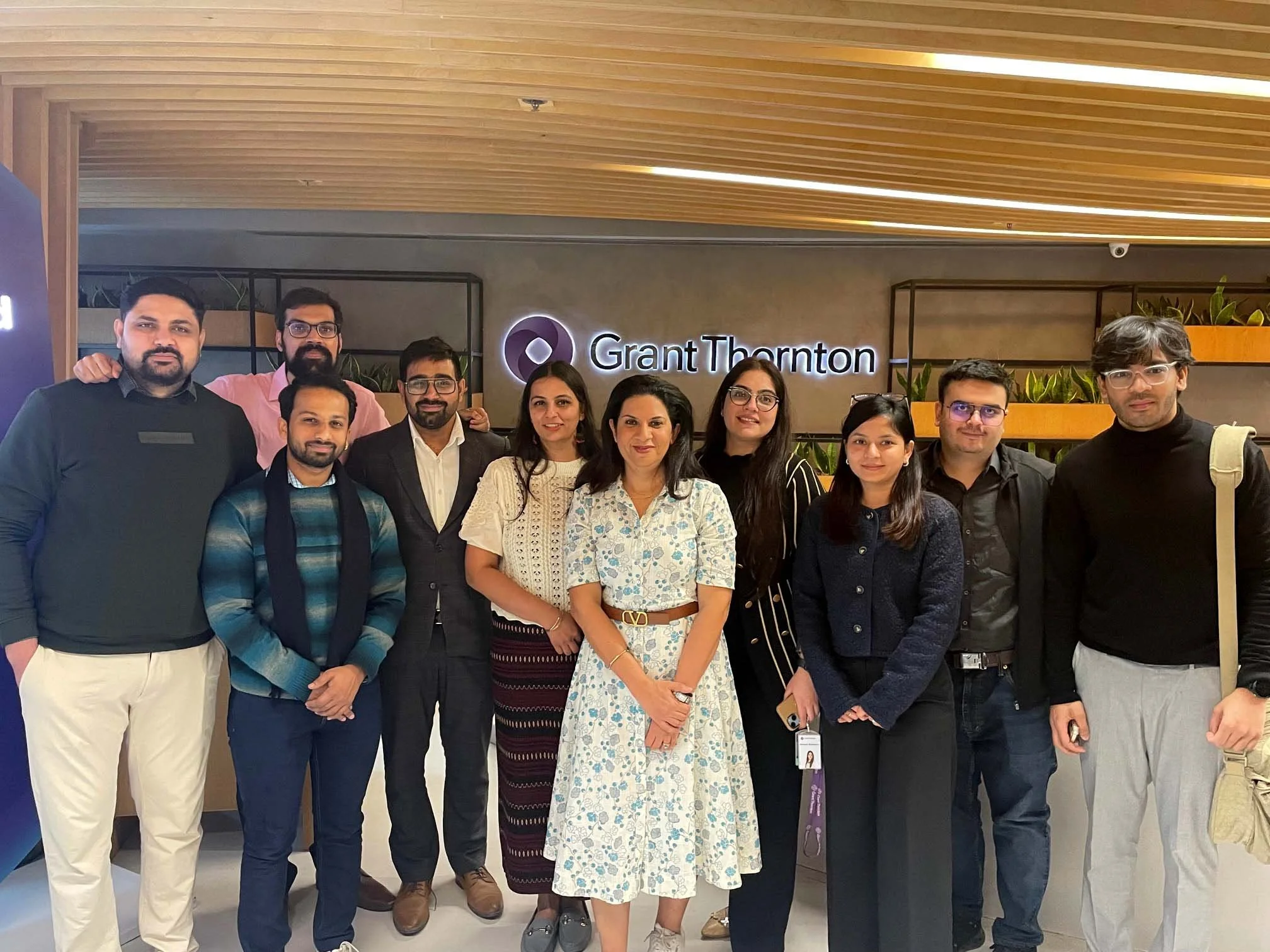 Group of Grant Thornton employees smiling.