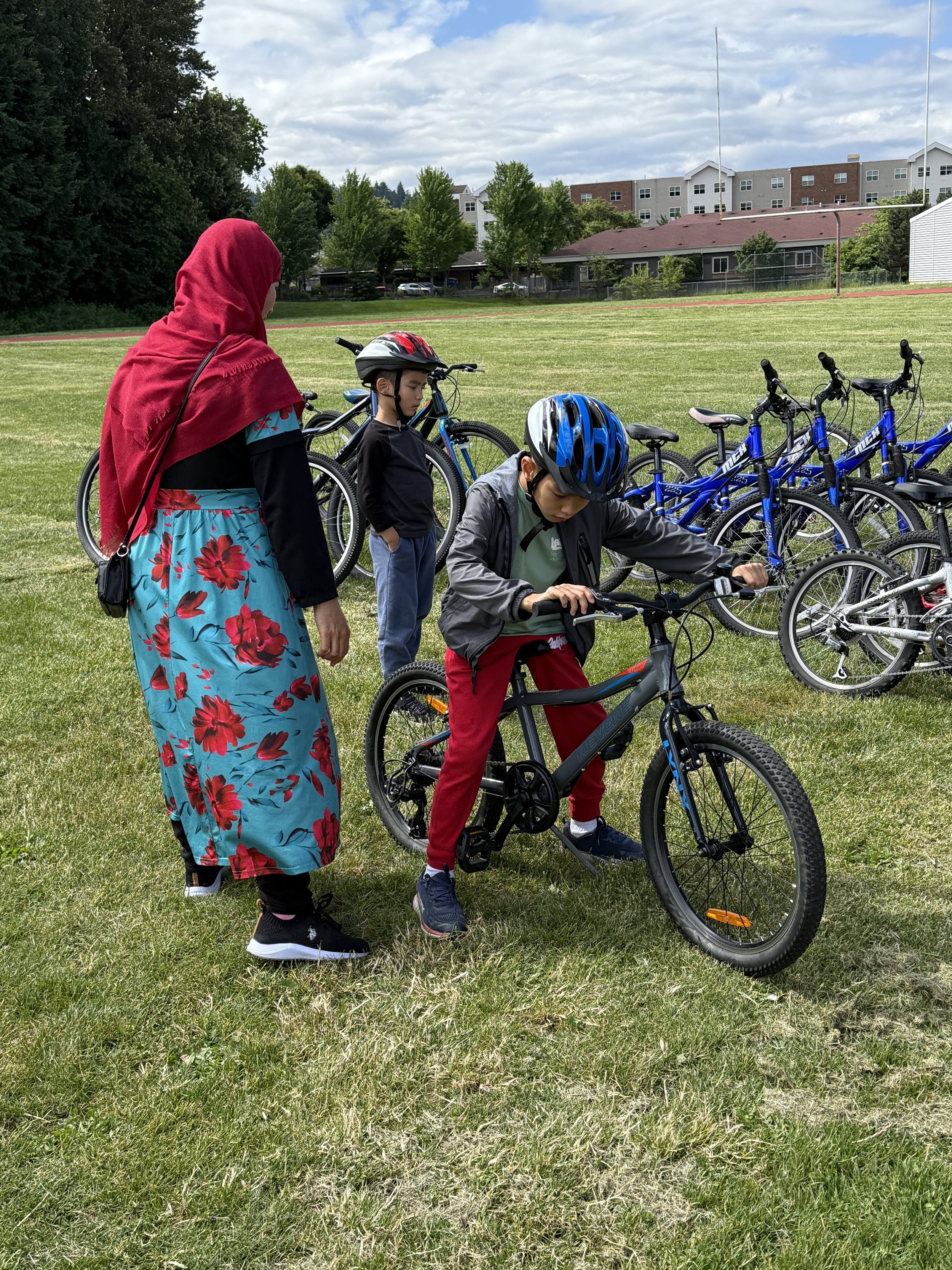 Kids riding bikes at community event