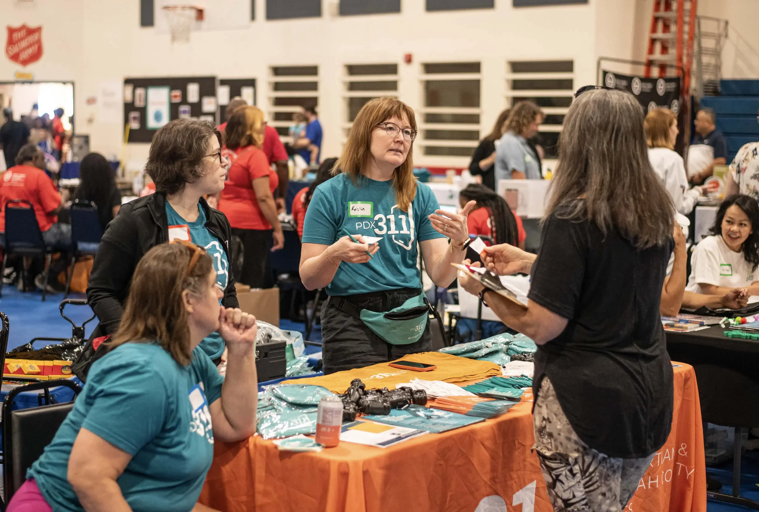 Employee of Portland 311 doing community outreach