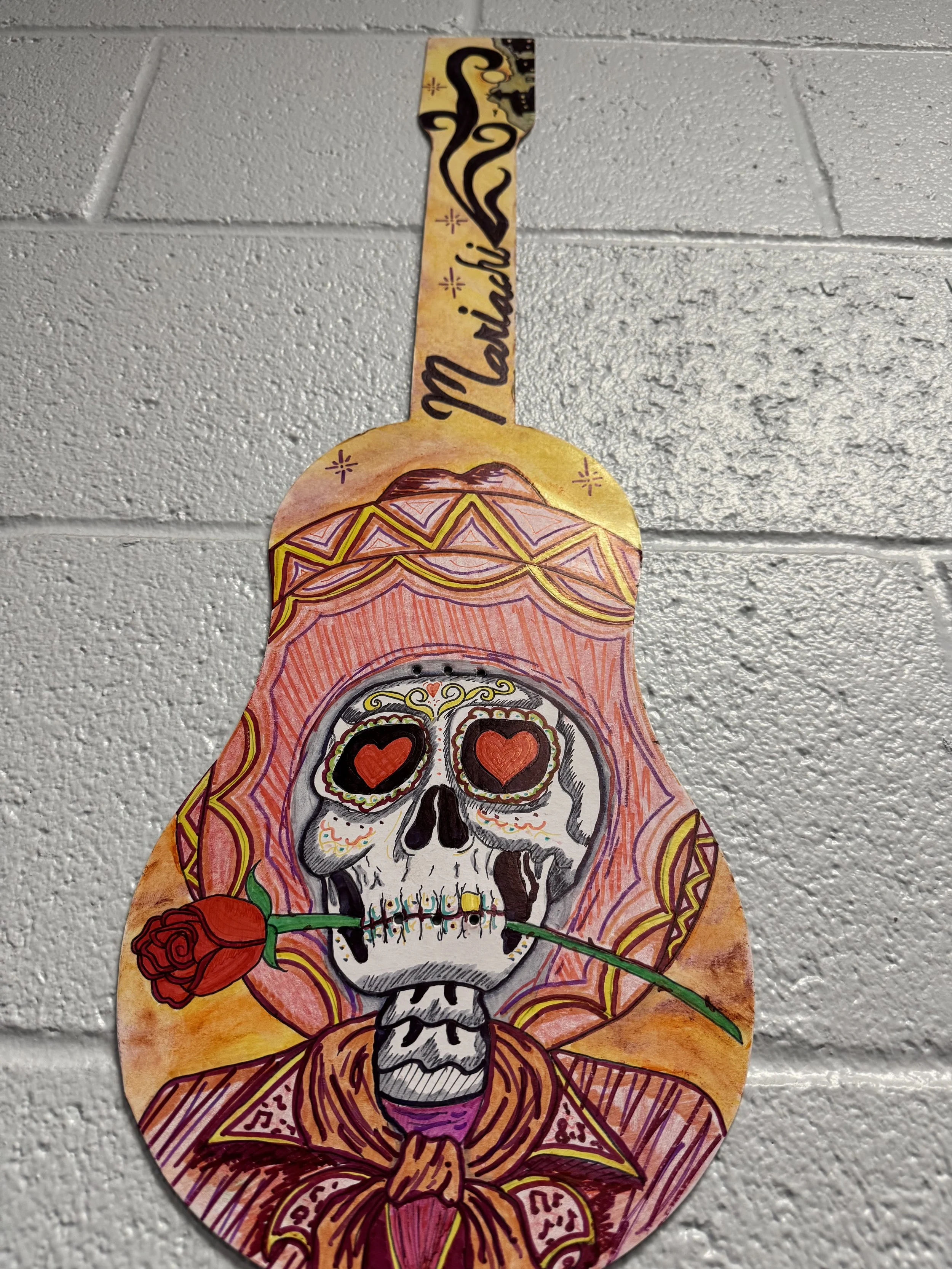 Illustrated cutout guitar from Durango Juvenile Center supporting FG4K Guitar Club
