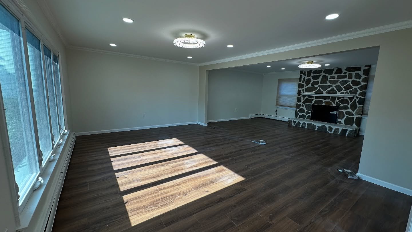 Transforming spaces one wall at a time! 🚀 Removed the middle divider to create this open, airy living room, complete with sleek new vinyl floors and fresh neutral paint. 🏡✨

#HomeRenovation #OpenConceptLiving #InteriorMakeover #DIYInspo