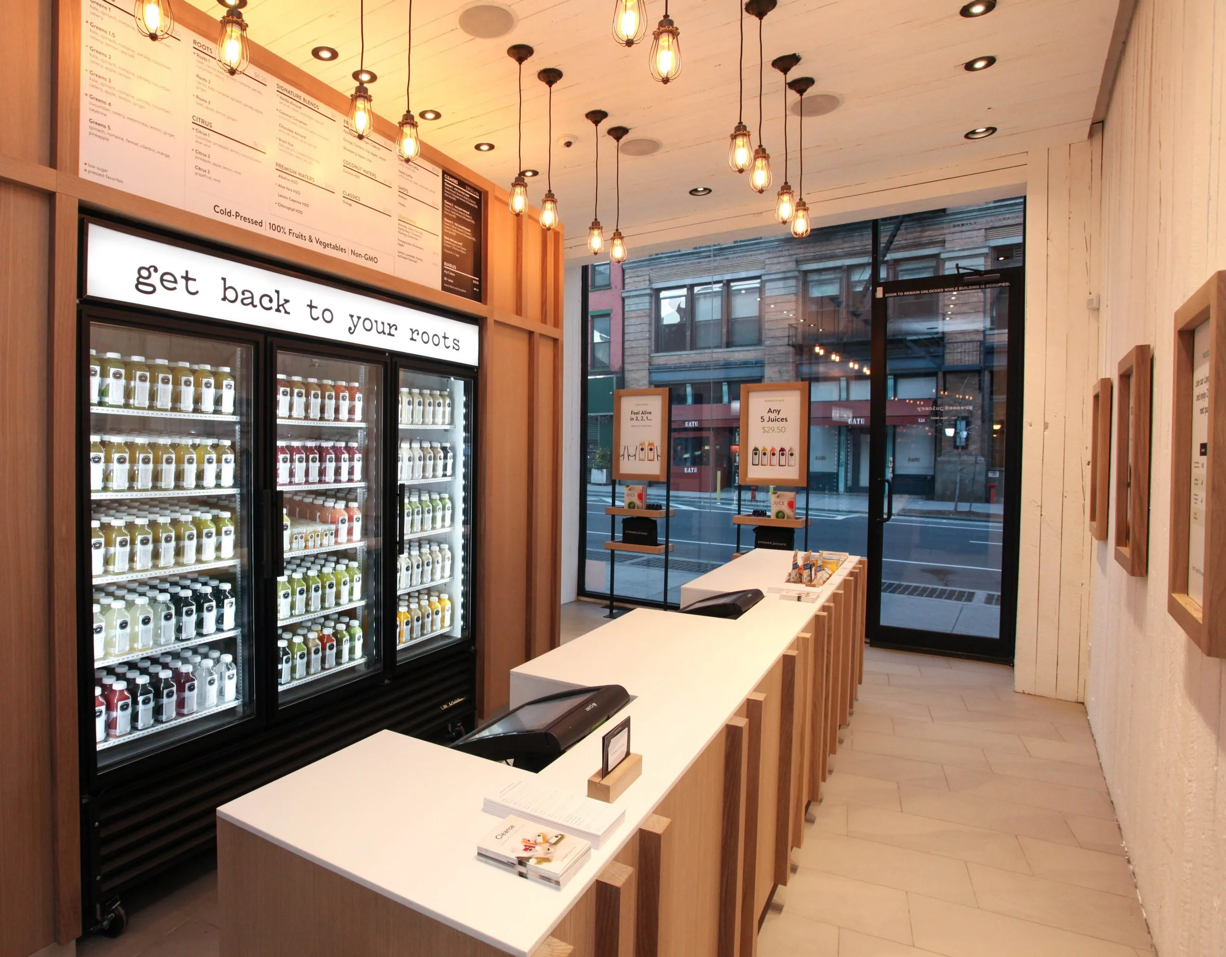 Existing reclaimed wood walls and ceiling were whitewashed to open up the narrow space.