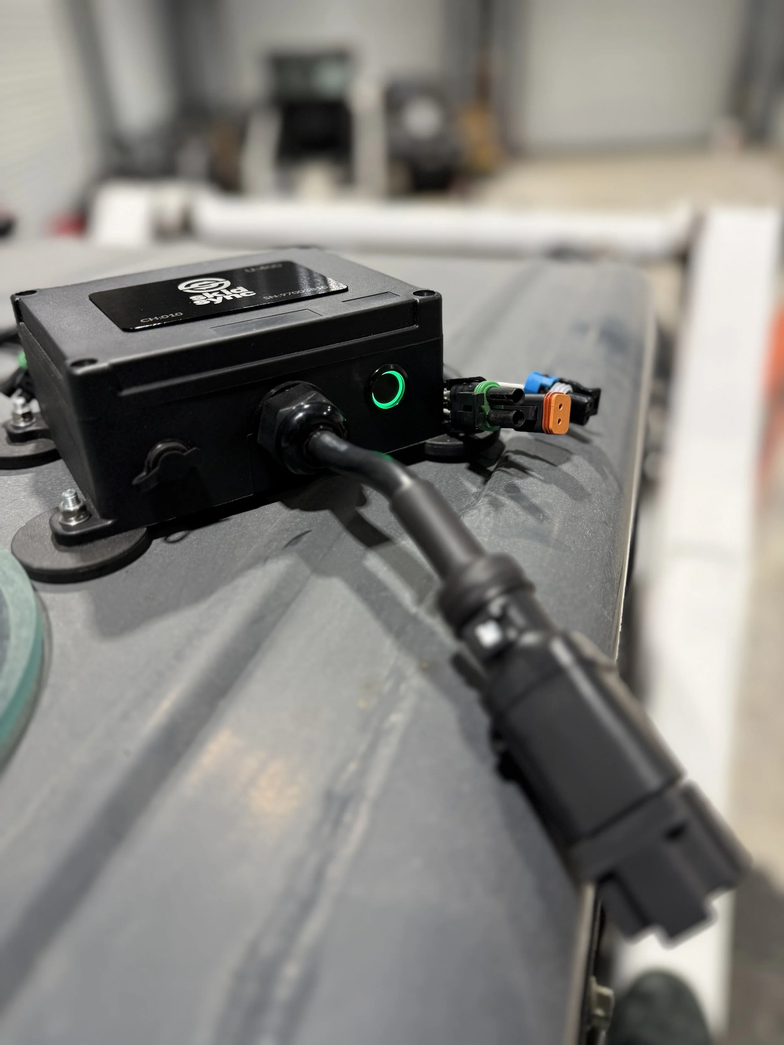 Universal Skid Steer Harness vs. Wireless Control Box: Which Is Better?