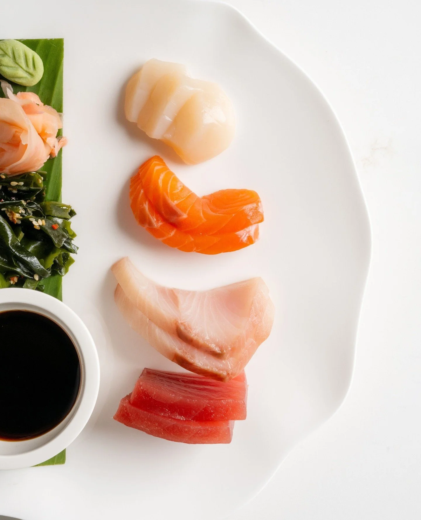Sashimi of salmon, kingfish, tuna and scallops, prepared simply. Fresh, carefully sourced seafood served with wakame, pickled ginger, wasabi and a light sashimi dressing.⁠
⁠
#RickSteinAtCoogeeBeach #CoogeeBeach #FreshSeafood #Sashimi⁠
#SydneyDining