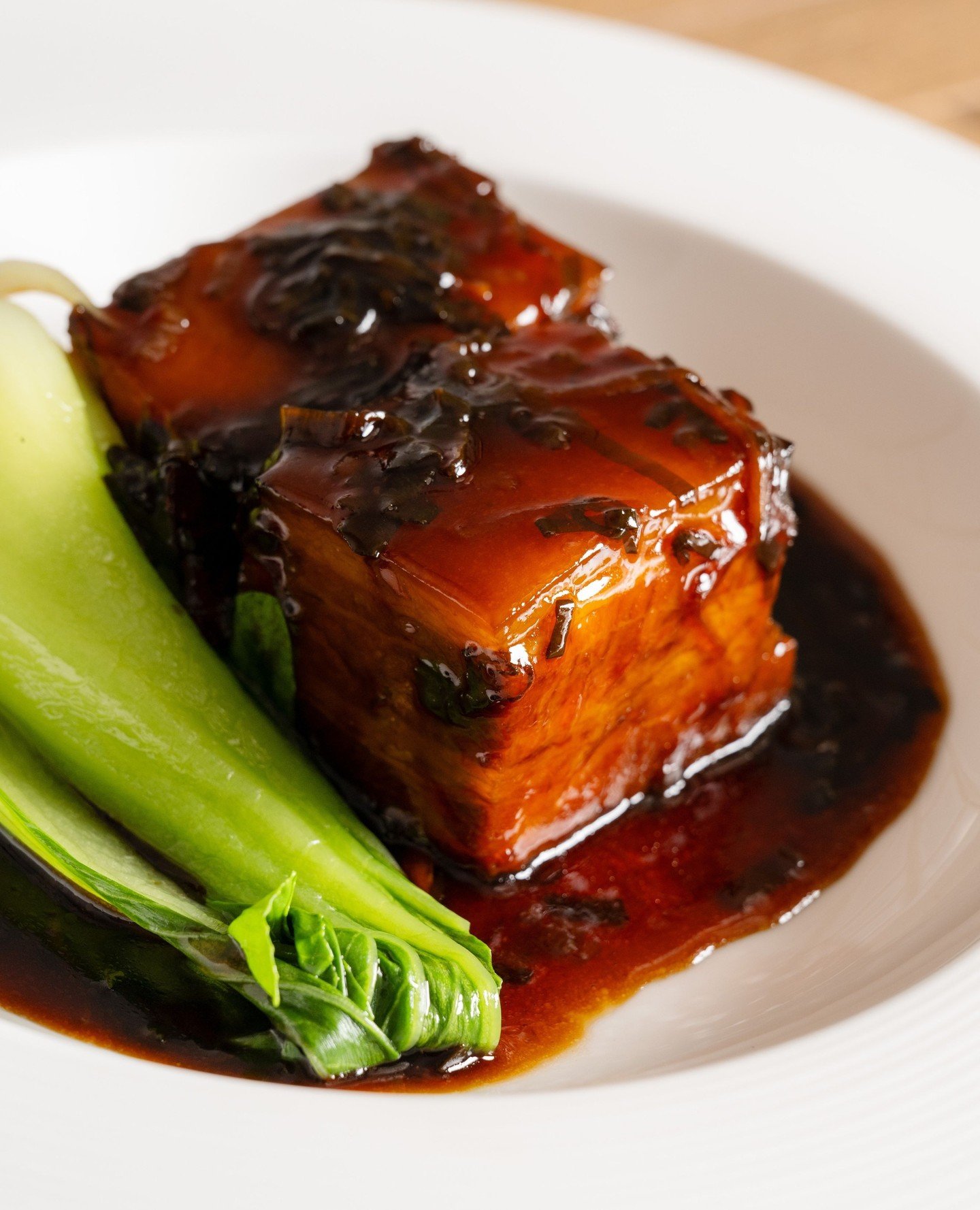 Red-braised Kurobuta pork belly, slow-cooked until tender and finished in a sweet-and-sticky soy and black vinegar glaze. Served with steamed bok choy.⁠
⁠
#RickSteinAtCoogeeBeach #PorkBelly #SydneyDining #CoogeeBeach #AsianFlavours