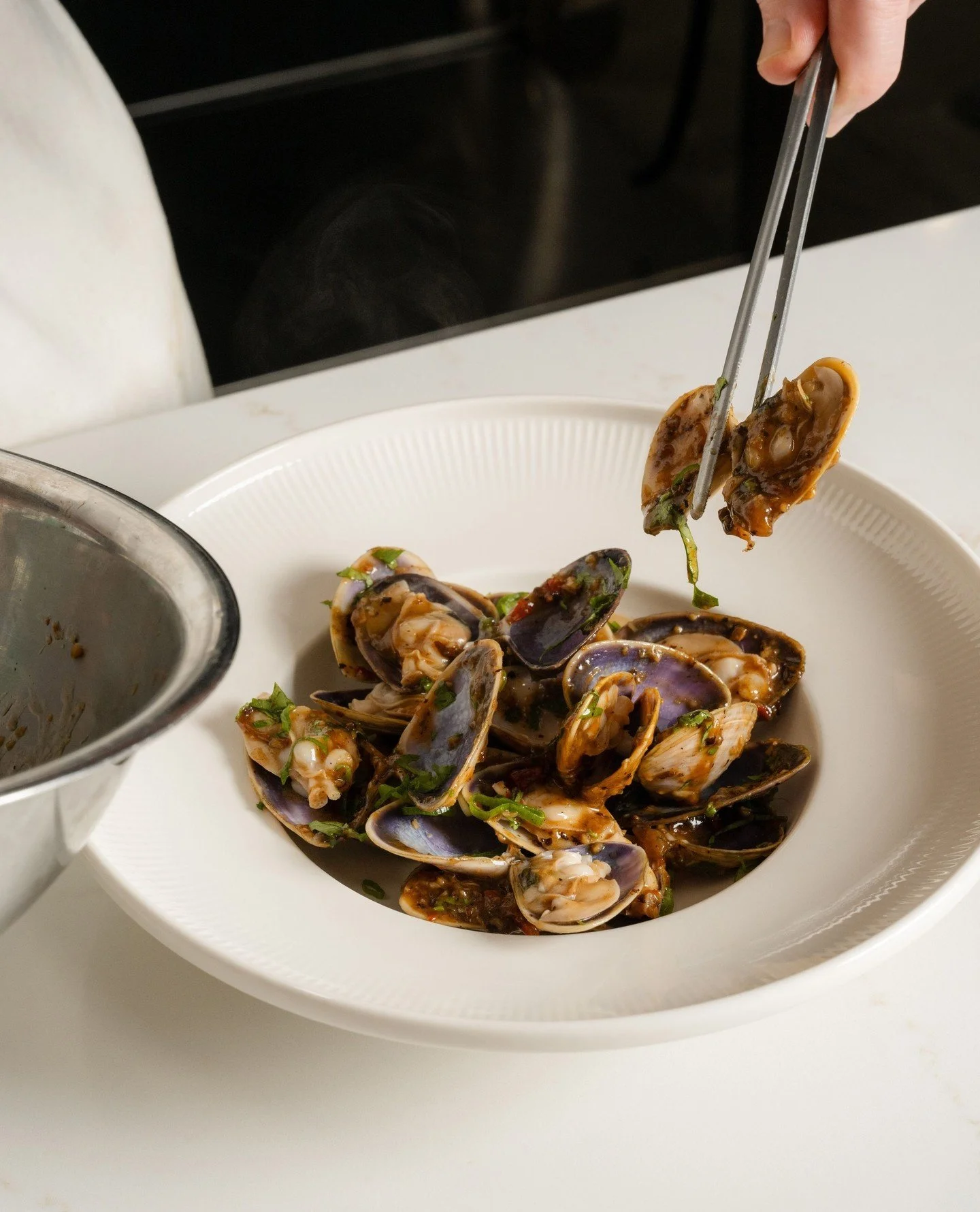 Pipis XO - a bold, vibrant combination of garlic, ginger and chilli, and one of Rick&rsquo;s favourite Chinese seafood dishes, elevated with beautiful Australian pipis.⁠
⁠
#RickSteinAtCoogeeBeach #CoogeeBeachDining #SydneySeafood #PipisXO #SydneyDini