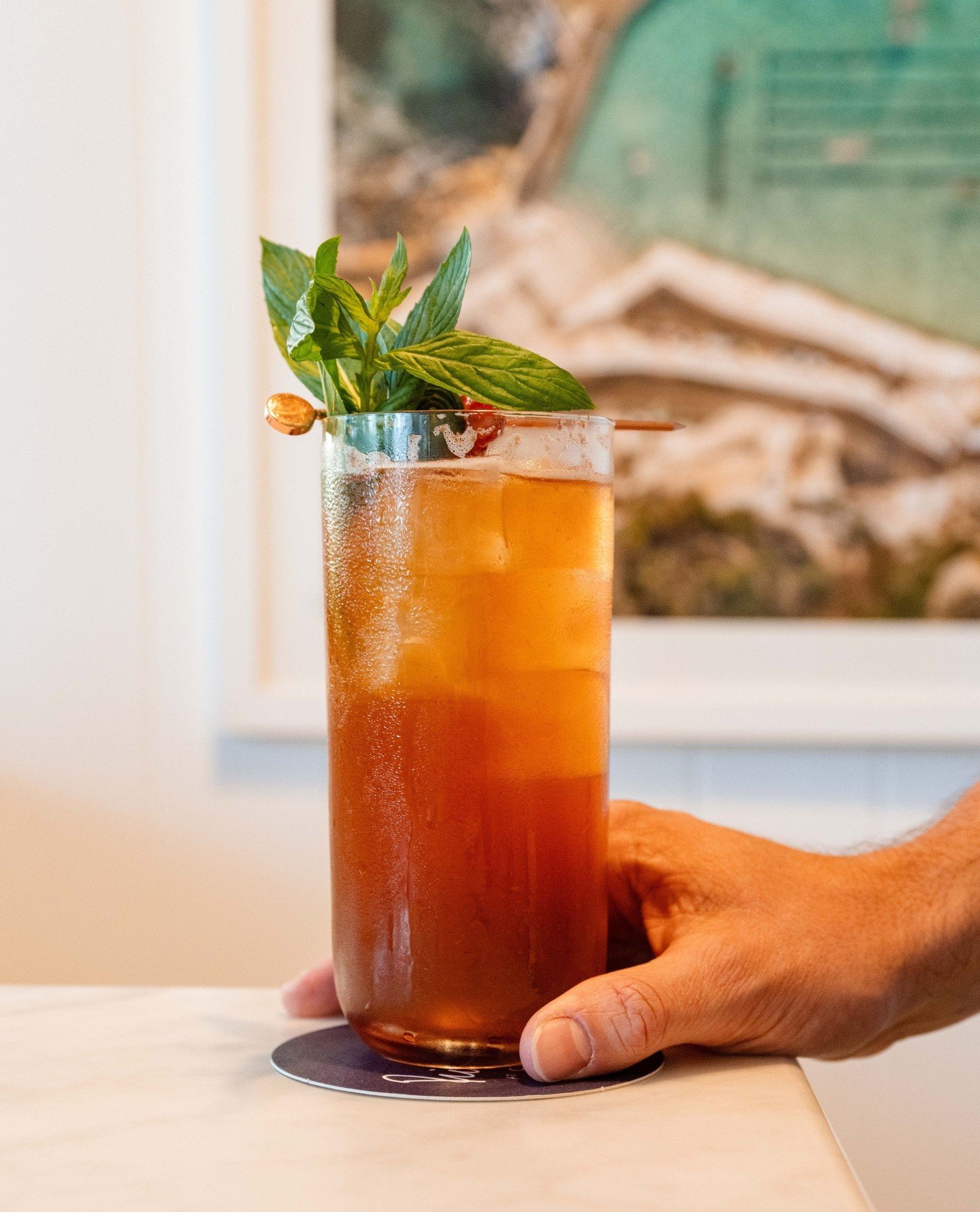 The Pimm's Cup, reimagined. Four Pillars Bloody Shiraz Gin brings depth and a darker fruit edge, lemon sherbet sharpens the middle, and ginger ale lifts the whole thing into something brighter than the original. The same easy afternoon drink, just dr
