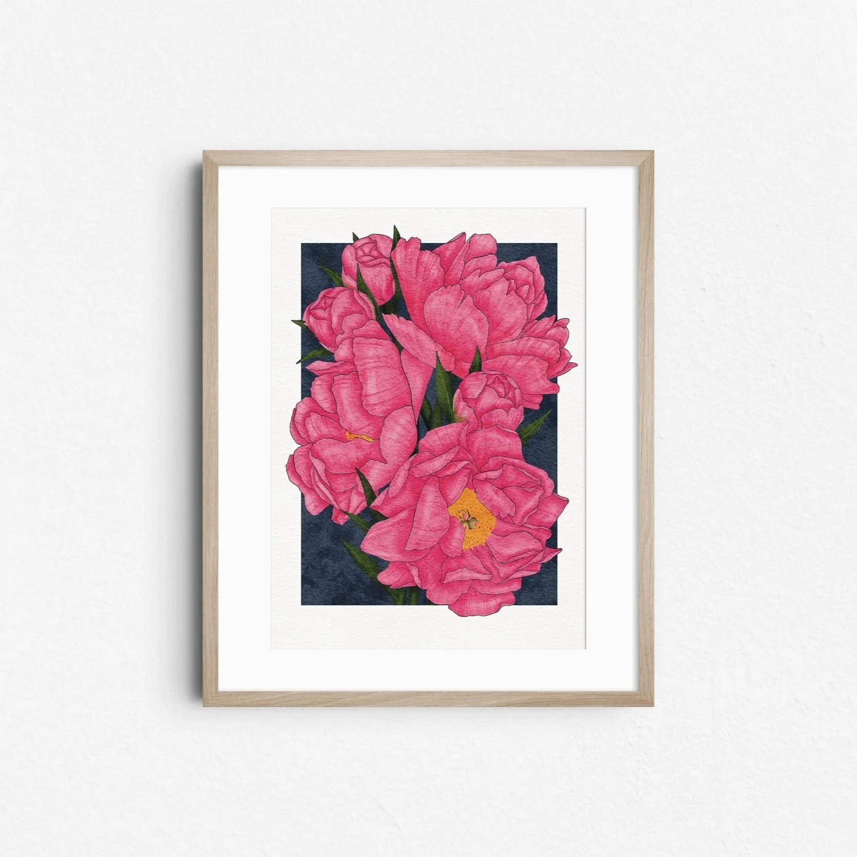 Karl Rosenfield Peonies art print by Liz Govier Art Studio, vivid digital painting of bright pink peonies with golden centres on a deep navy background, framed in light wood.