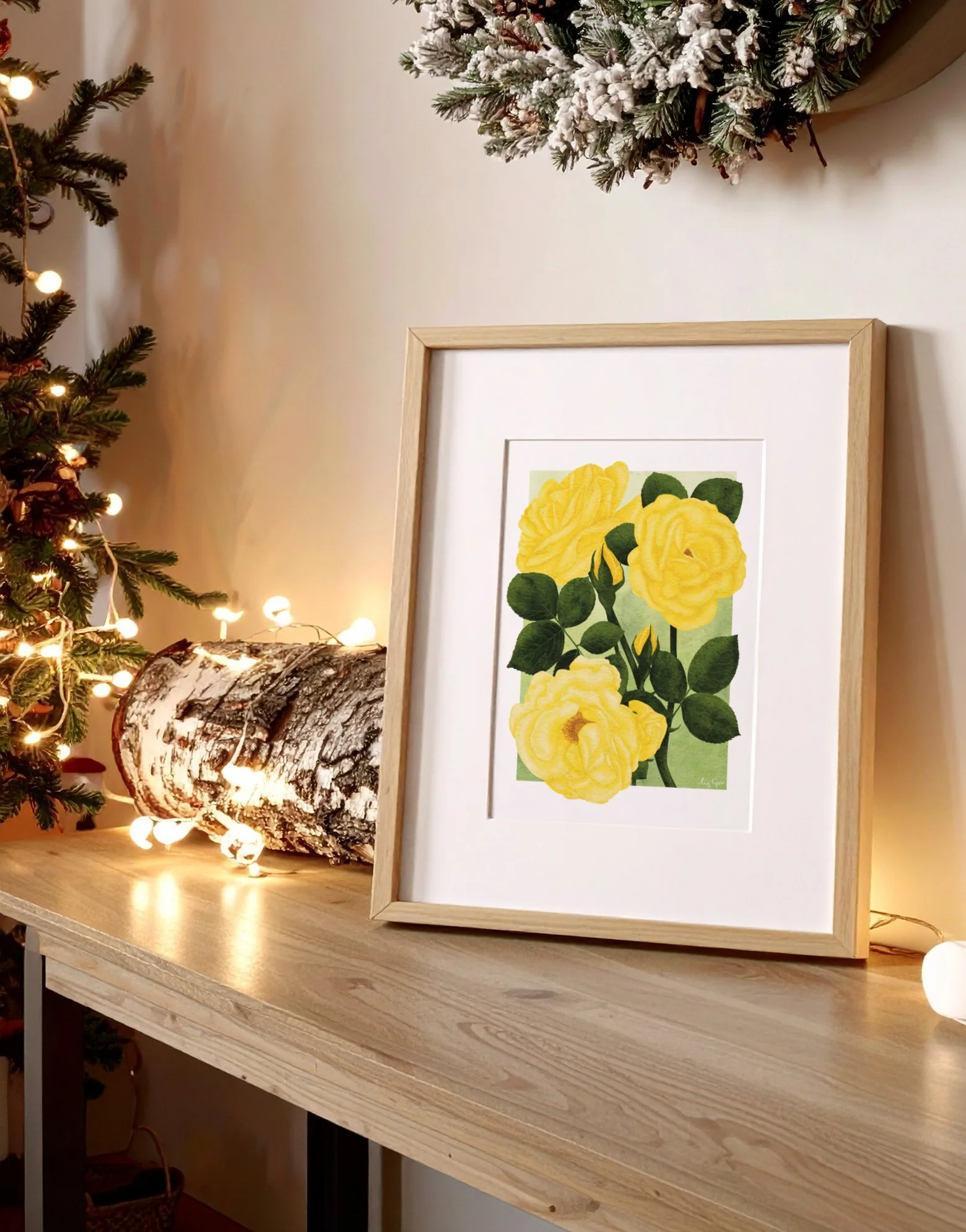 Framed Yellow Roses fine art print displayed with natural wood and warm seasonal lighting, styled for a calm winter setting.