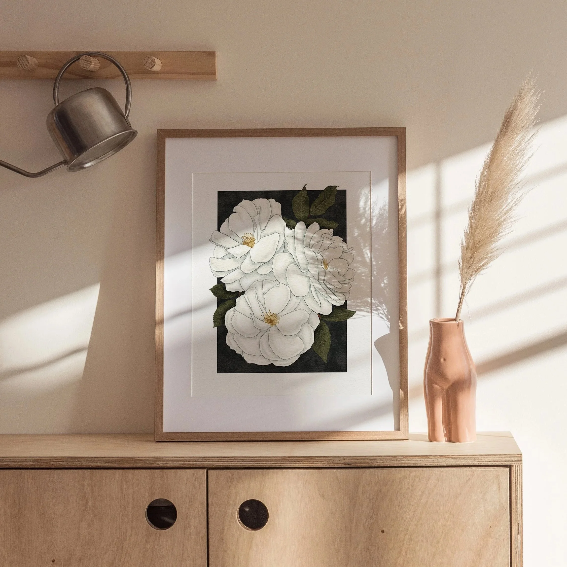 Framed Madame Alfred Carrière roses art print styled with a copper vase and pampas grass, fine art botanical illustration by Liz Govier Art Studio.