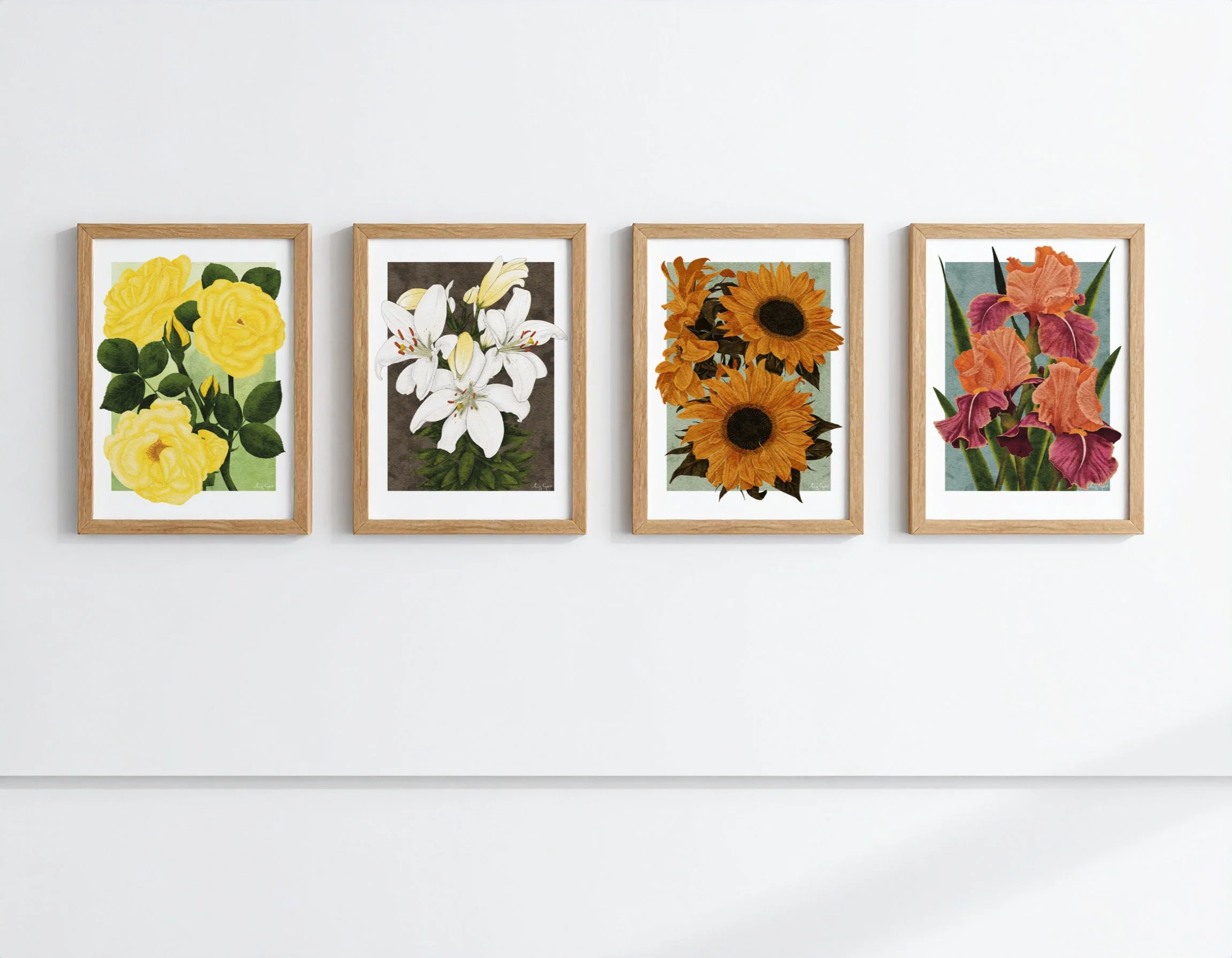 Fine art botanical prints by Liz Govier Studio displayed in sequence on white gallery walls, with natural oak frames and soft light.