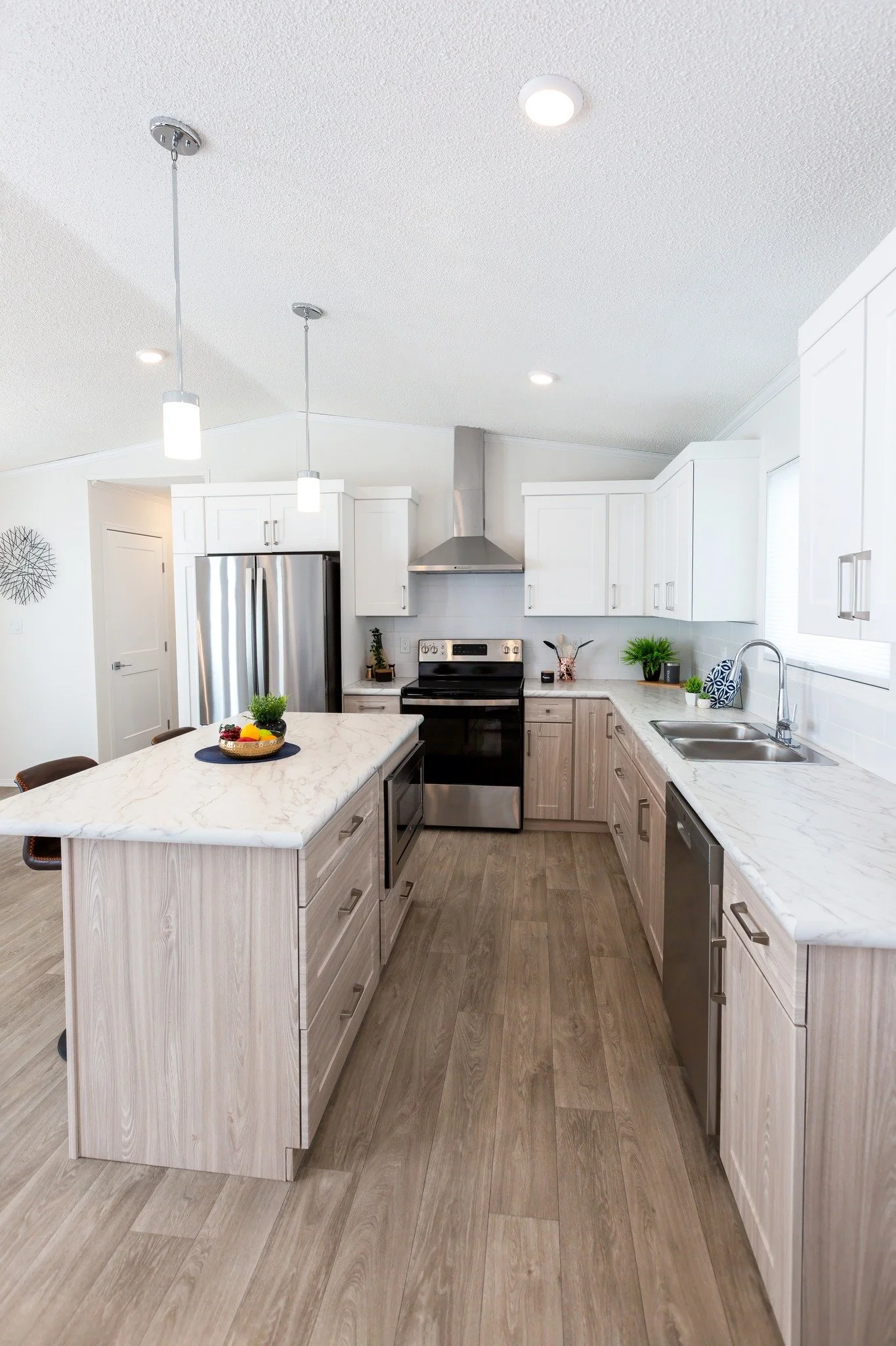 The Perfect Kitchen, Fully Equipped.

At Monterey Estates North, your new chapter comes with a modern edge. Every home includes a full suite of stainless steel kitchen appliances as a standard feature.