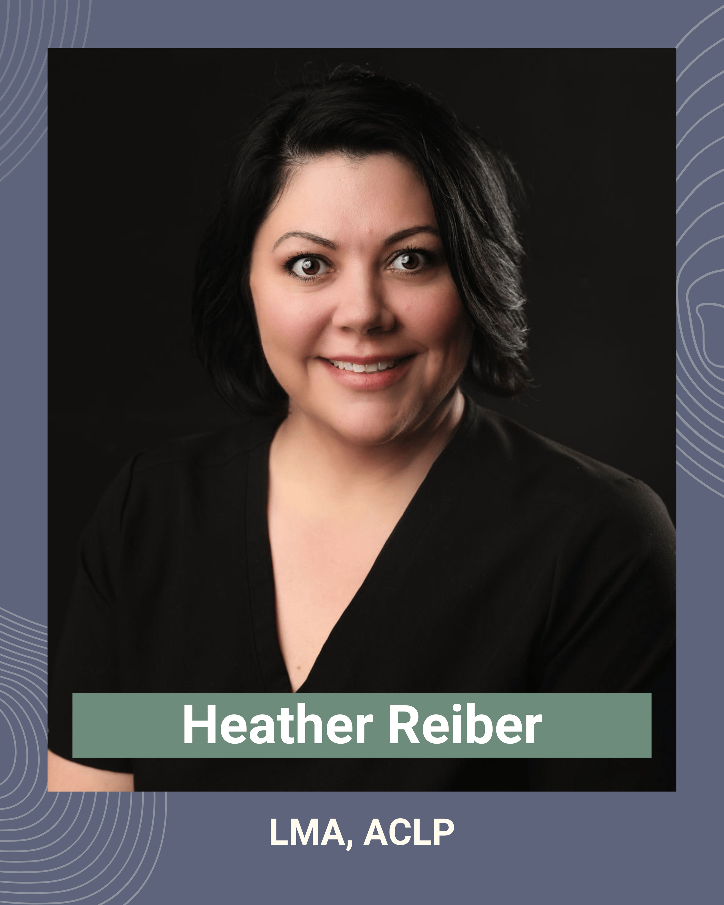 Professional headshot of Heather Reiber, a woman with short black hair, light skin, wearing a black top, smiling against a dark background.