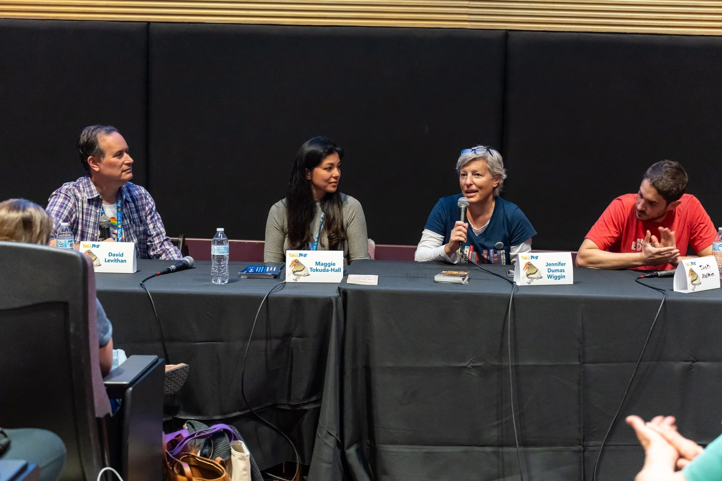 In the Banned Together panel, authors David Levithan and Maggie Tokuda-Hall talked with filmmaker Jennifer Dumas Wiggin and Josh Malkin from the ACLU about the impact of book bans