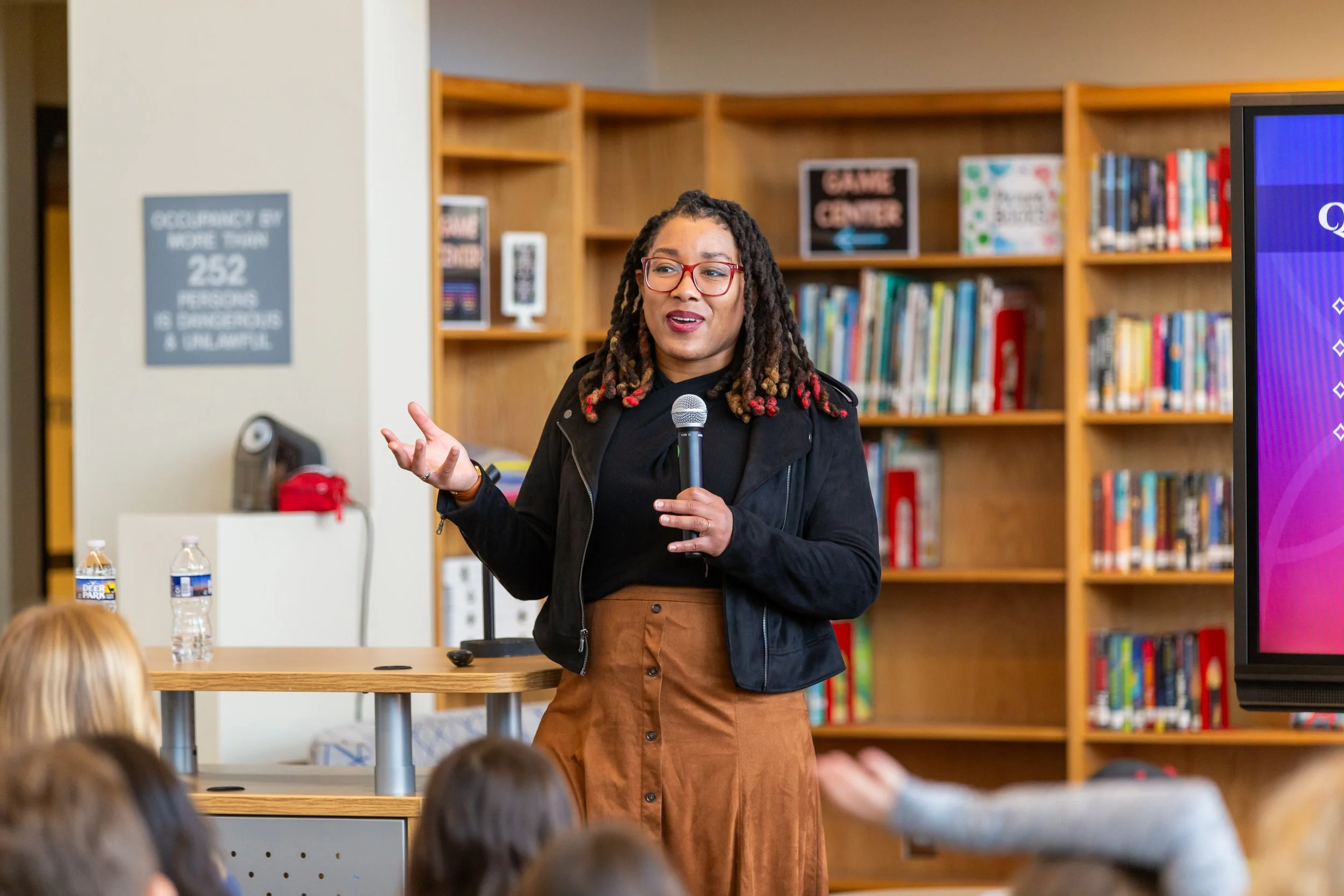 Author Tracy Deonn presents at a school visit