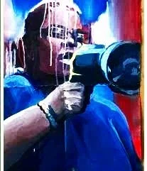 Person holding a camera taking a photo