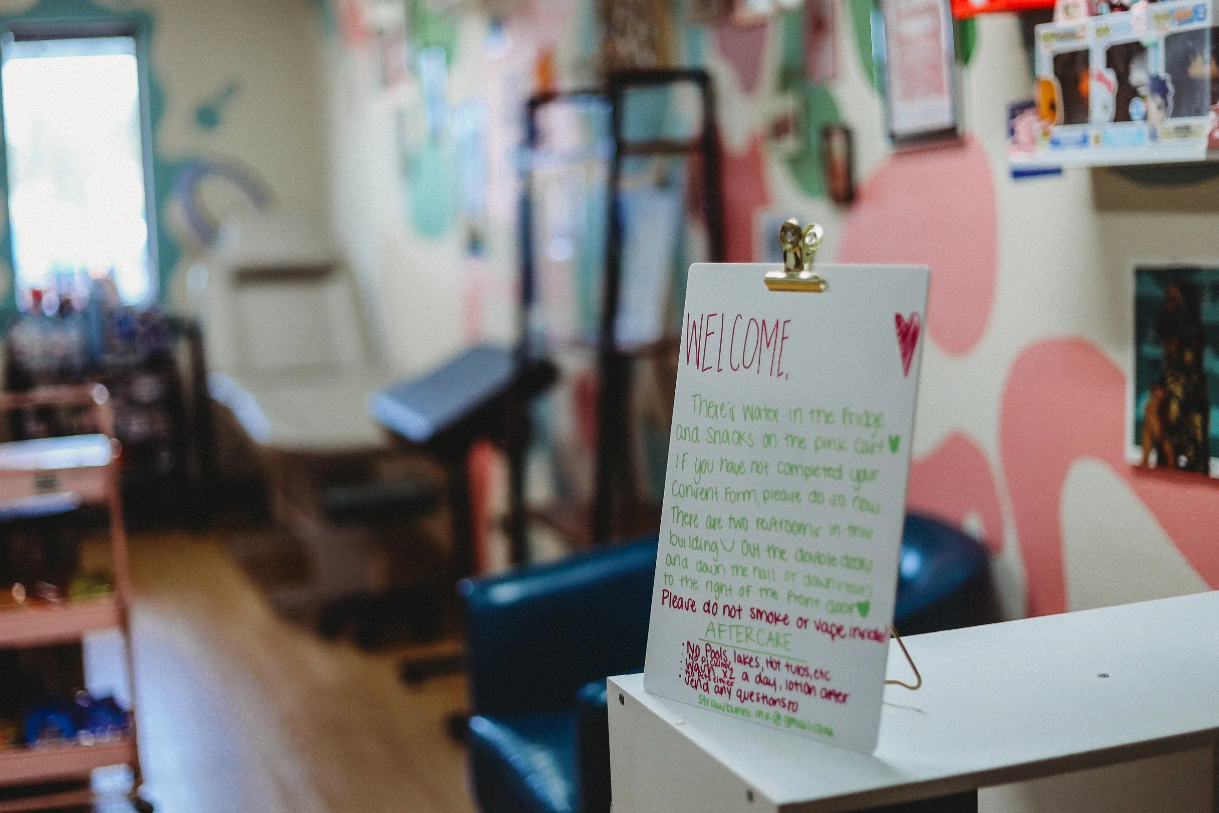 tattoo studio welcome sign
