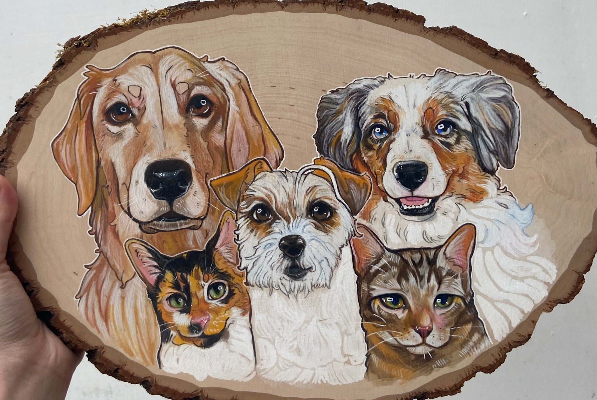 Painting of six pets on a wooden slab, including three dogs and three cats, with detailed features and colorful fur.