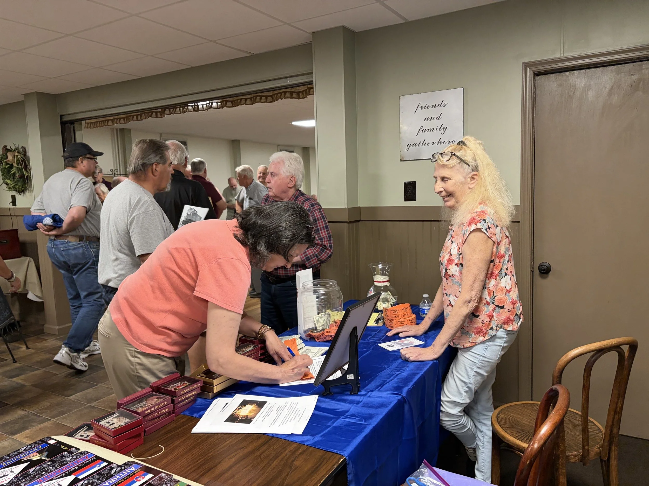 MAHS Secretary-Treasurer Luann Prokop at the Sign-In Table