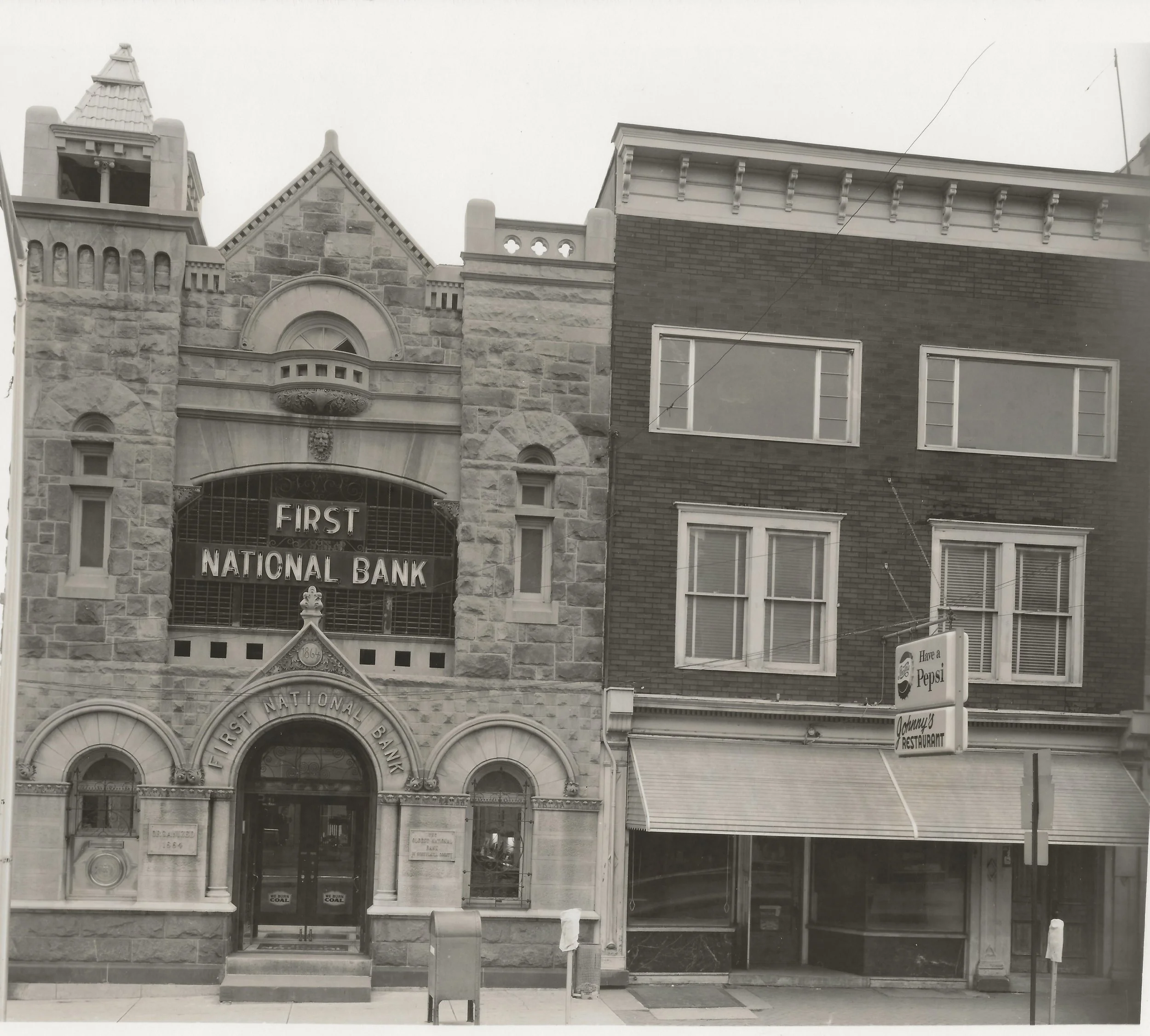 First National Bank and Johnny's Restaurant circa 1960