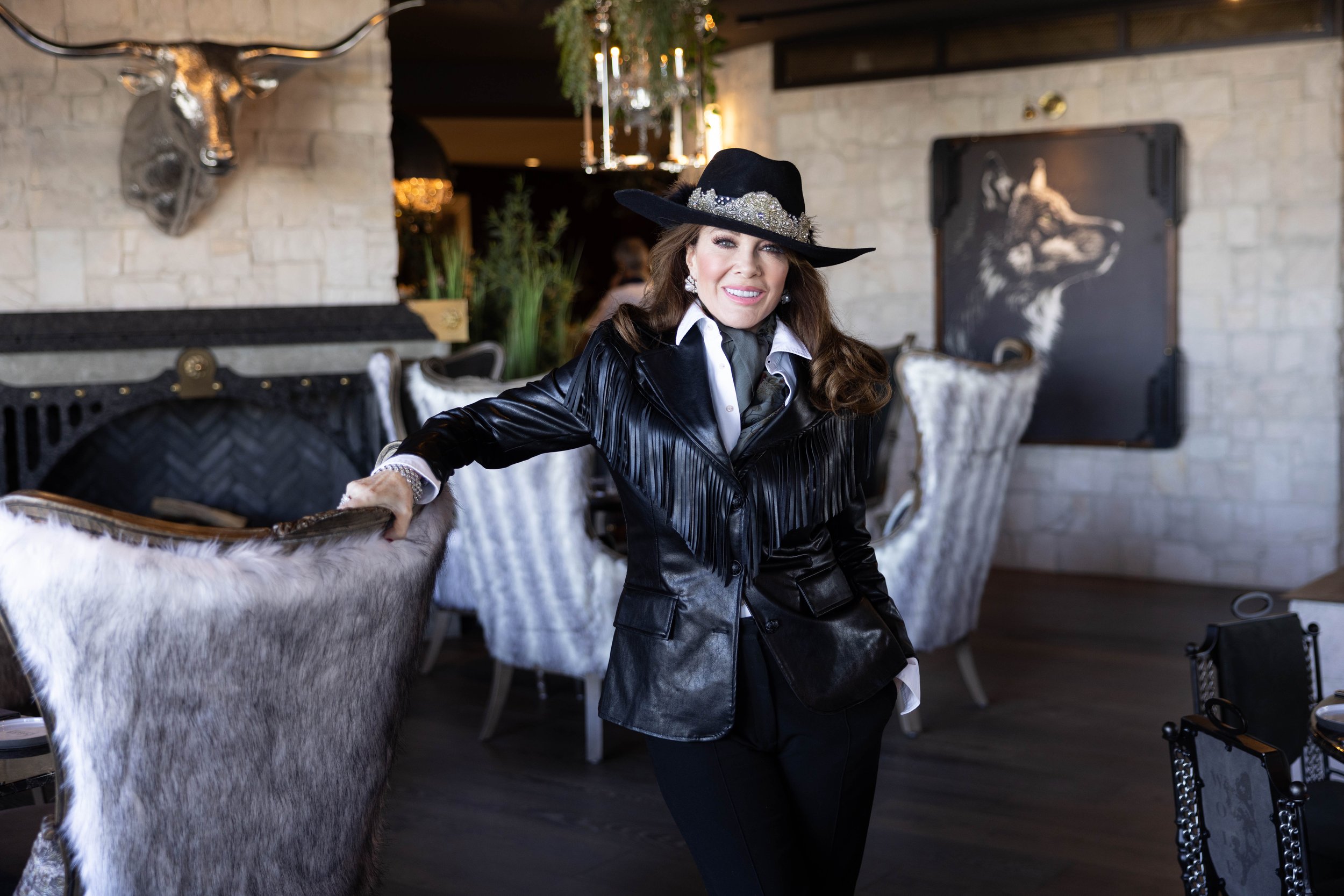 Lisa Vanderpump posing inside Wolf by Vanderpump Scottsdale