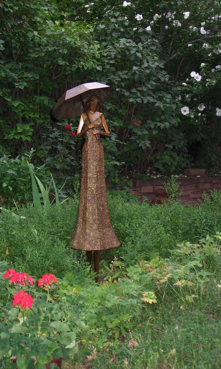 Umbrella Girl
48"H x 15"W x 13"D
Bronze edition of 25 (SOLD OUT)
