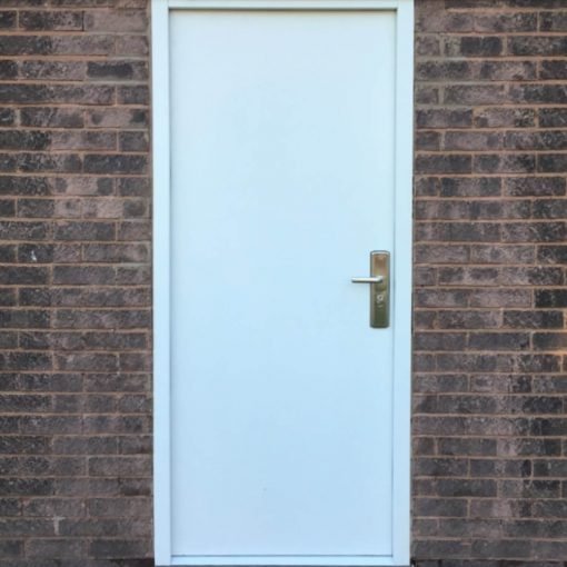 A plain white door with a silver handle set in a brick wall.