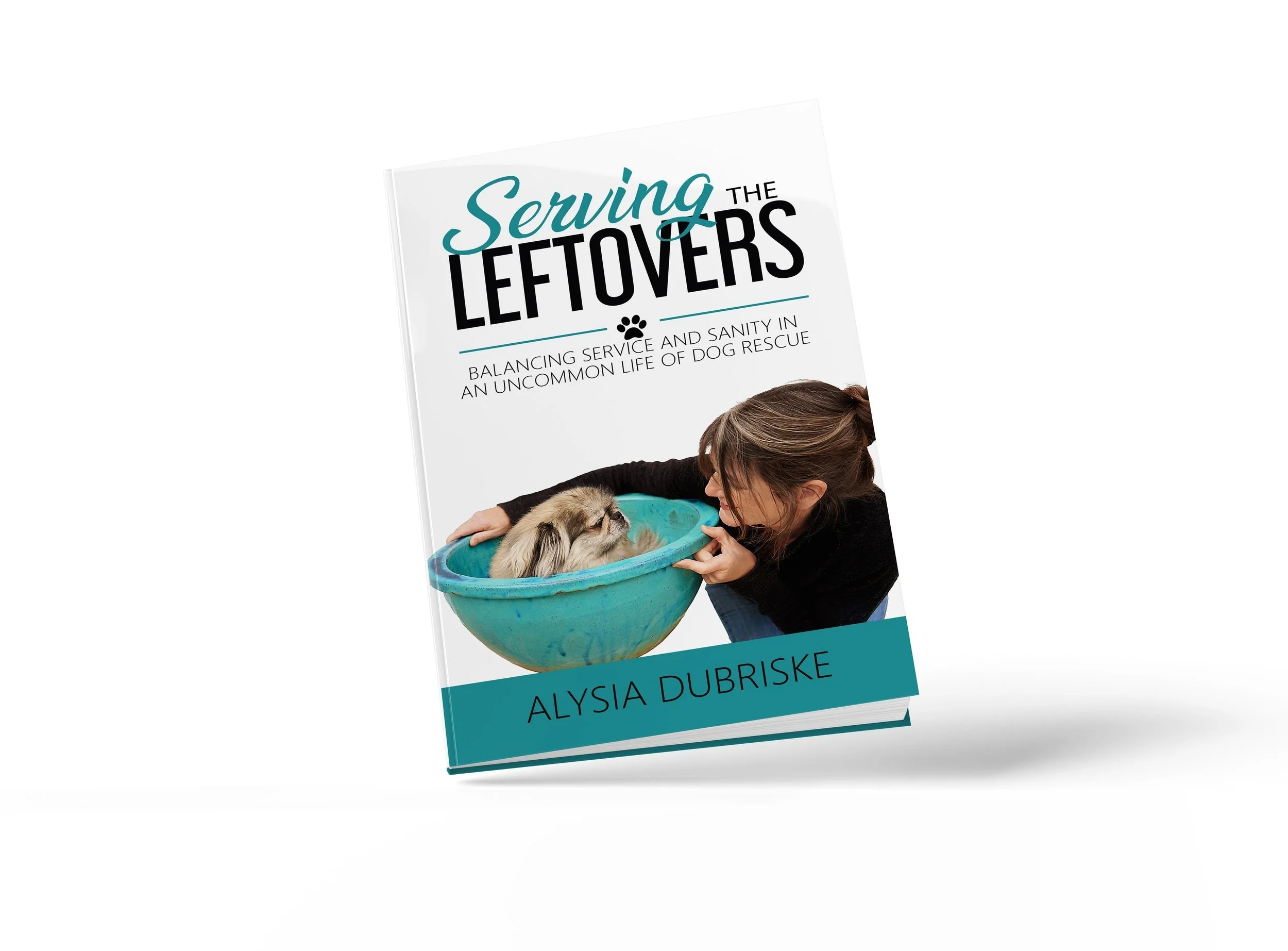 Book titled 'Serving the Leftovers' by Alysia Dubriske featuring a woman with brown hair leaning over a baby goat in a blue bowl.