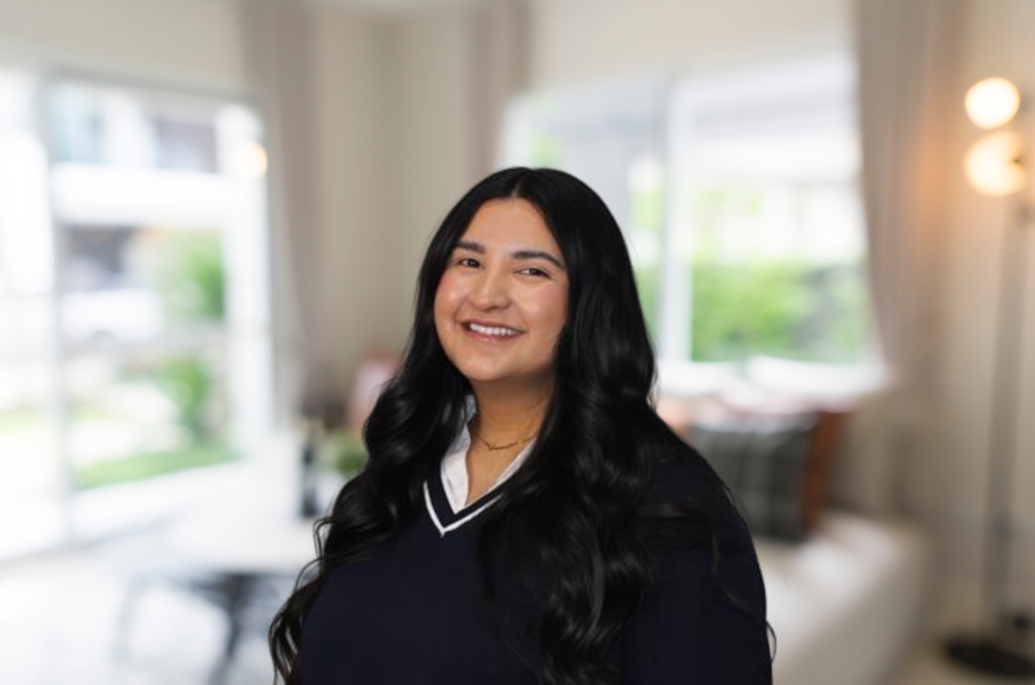 Viviana, Fiesta Homes member working with clients in the Odessa office
