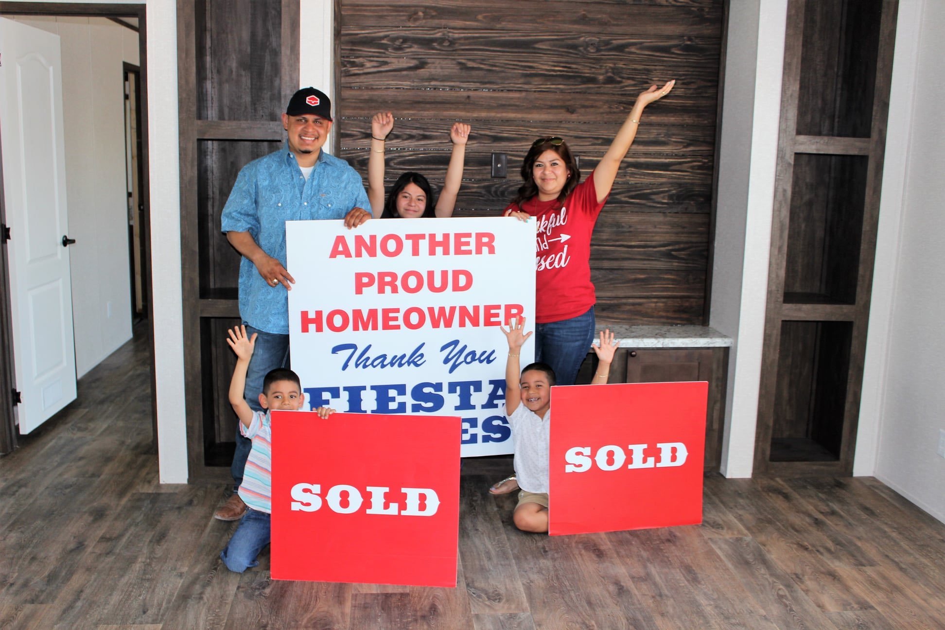 Family buying their first home to spend a wonderful family Christmas in their own home