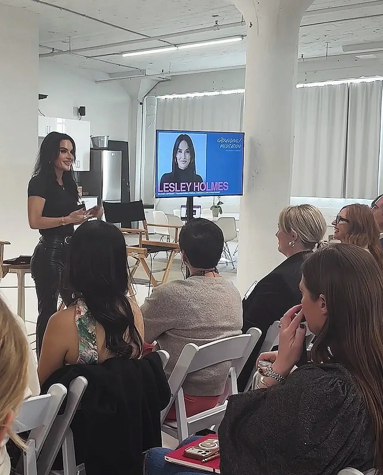Lesley Holmes in a speaking conference