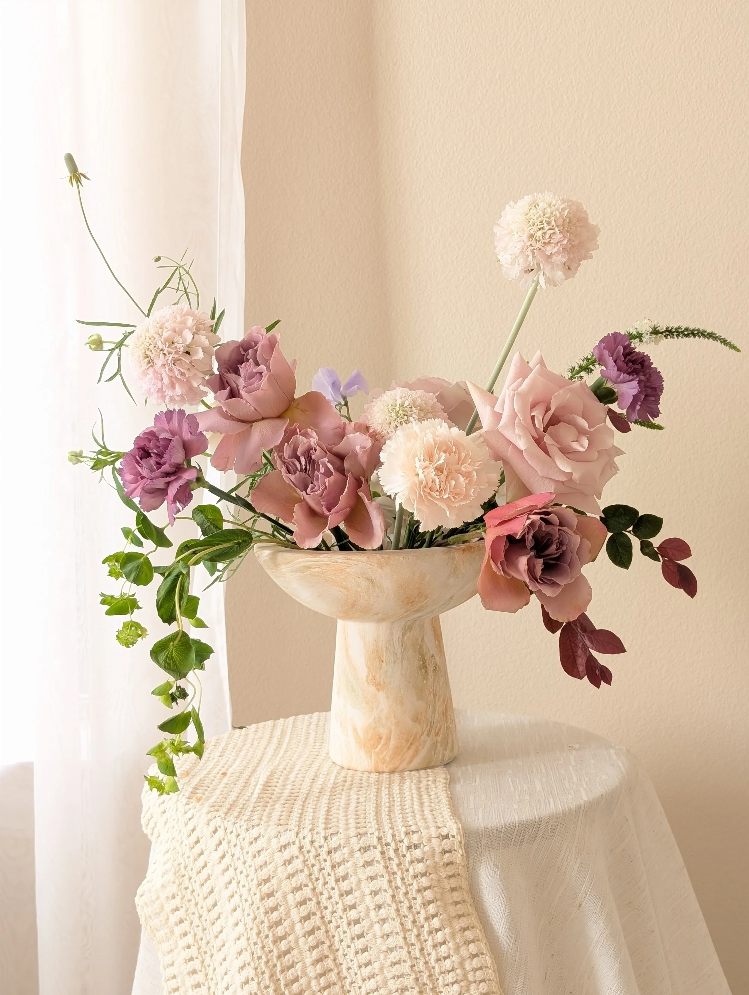 Luxury Floral Centerpiece in muted Cream and Purple Colors