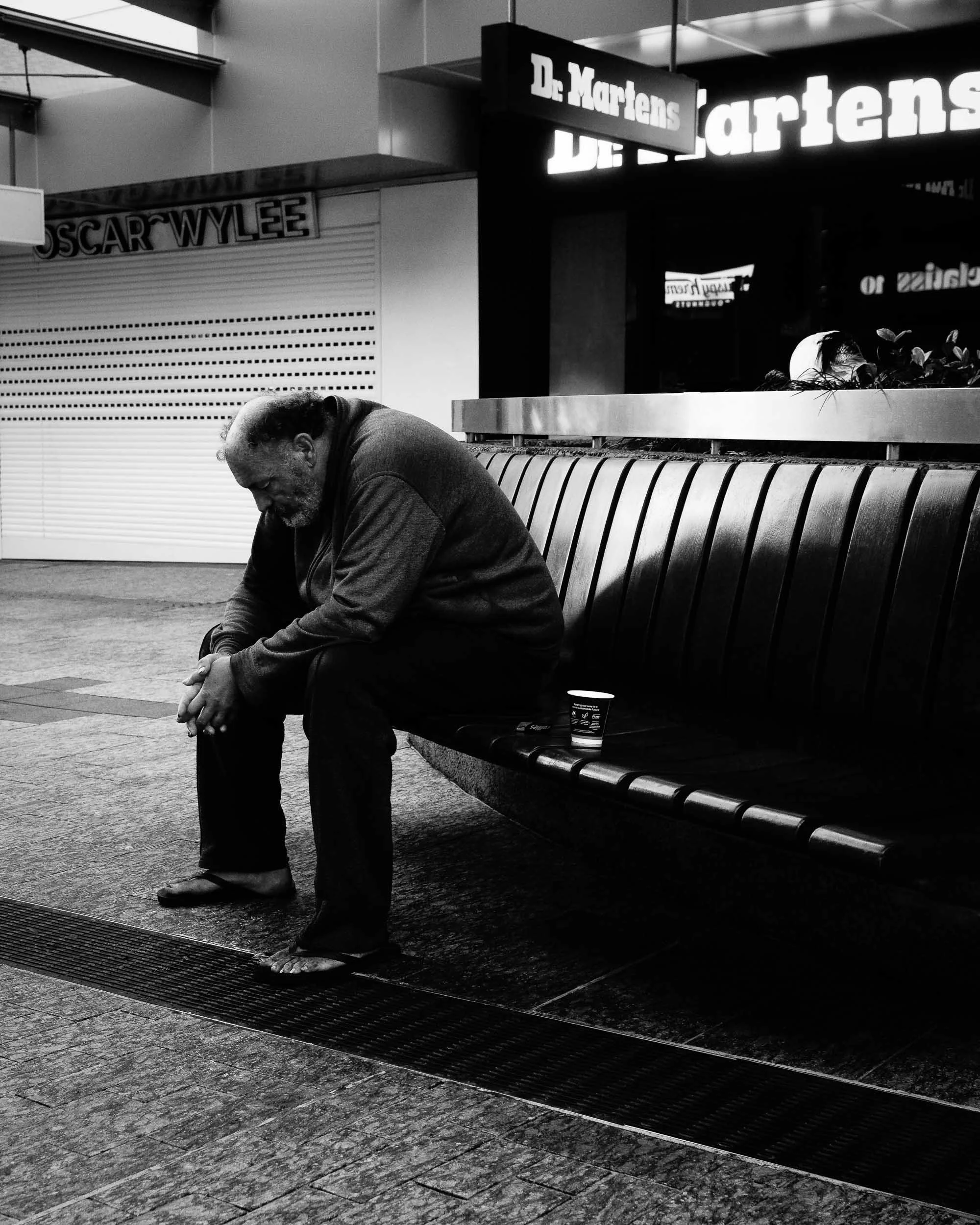 The Weight Within: Bent and burdened, a spirit where profound loneliness whispers. This unseen struggle, carried in silence, beautifully unveils the heavy, quiet truth of internal battles, etched into the human form.