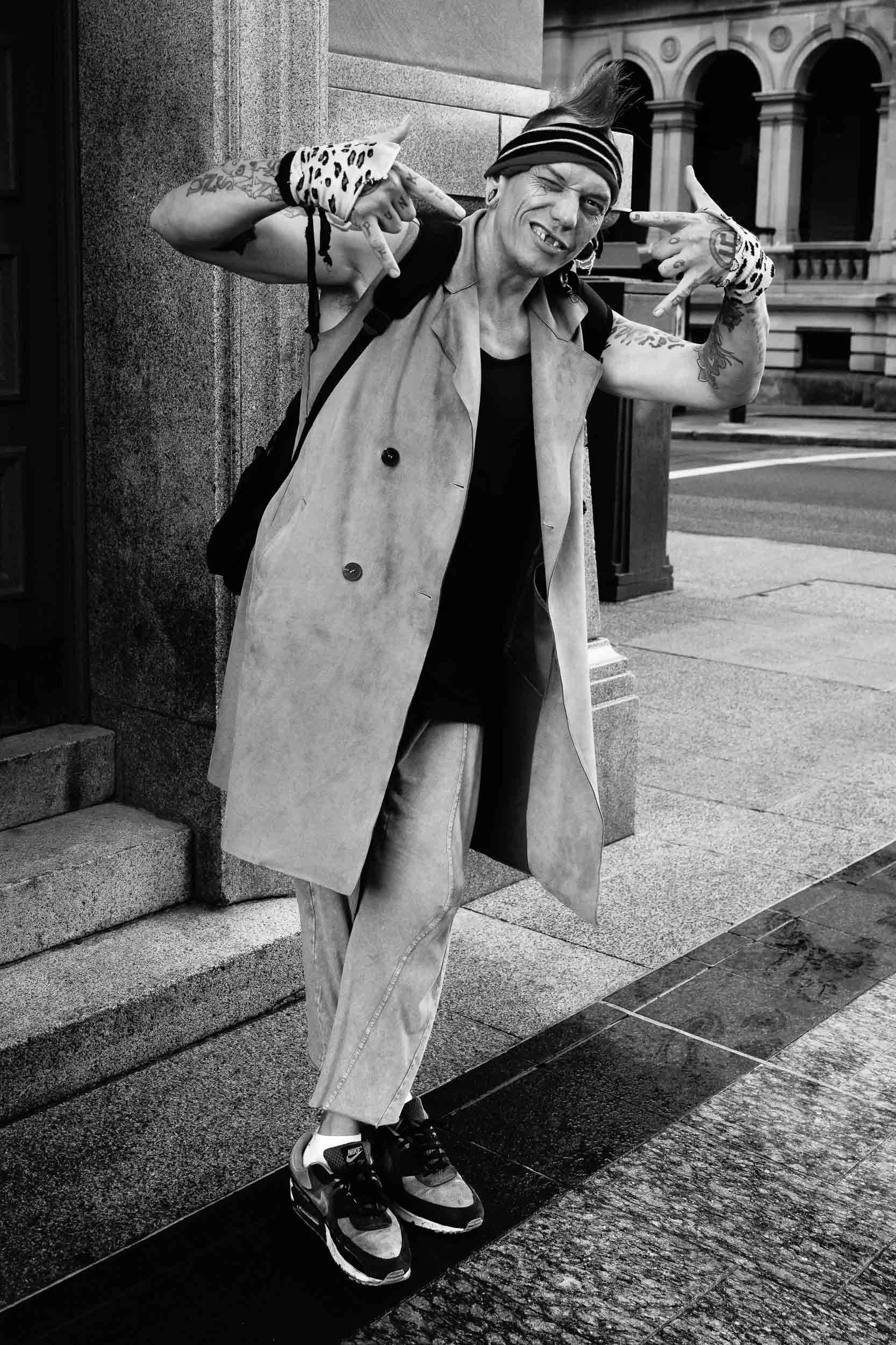 The Joy in the Unseen: Defiant joy and a vibrant spirit, beautifully captured as they emerge. This resilience, etched onto an urban canvas, reminds us that profound beauty and strength thrive in the unseen.