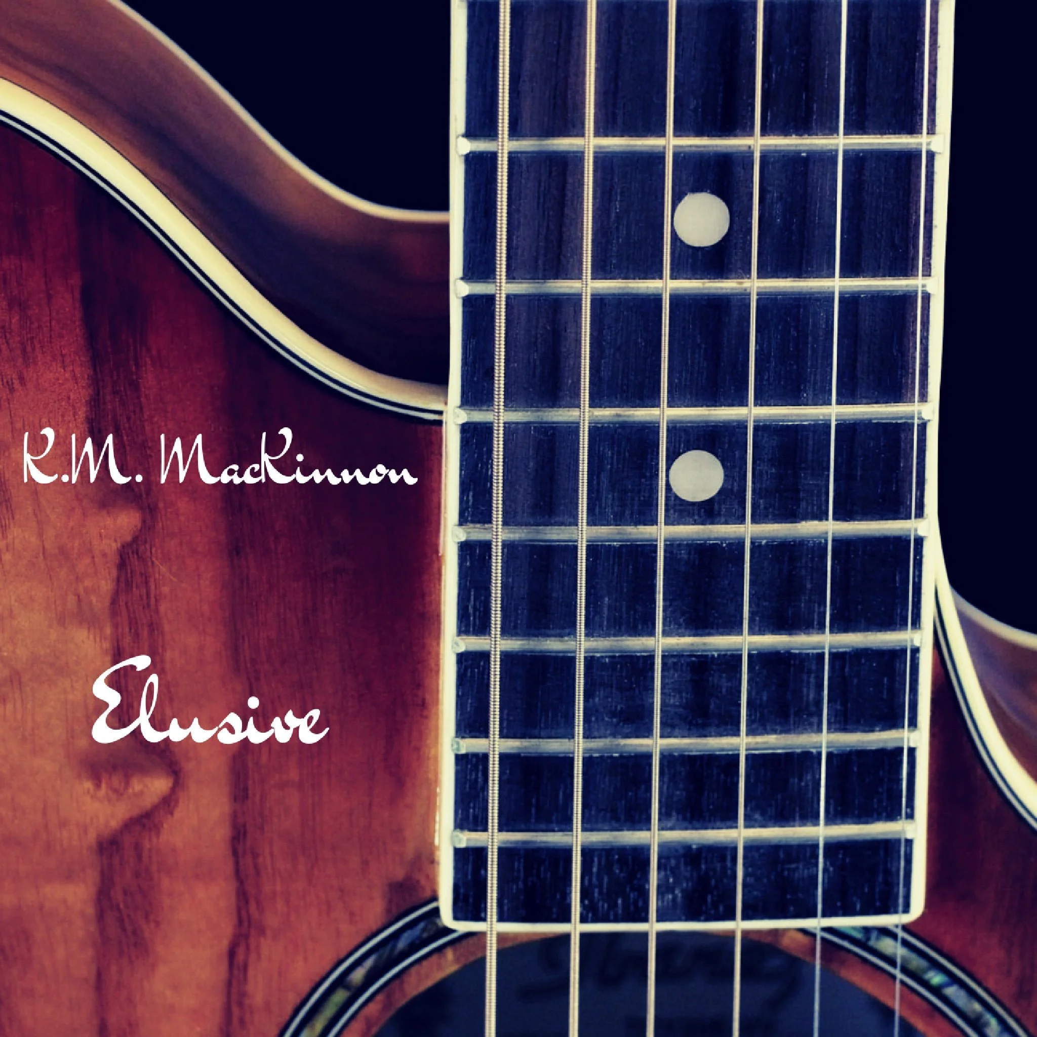 Cover of album titled 'ELUSIVE' by K.M. MacKinnon featuring a close-up of an acoustic guitar with a wooden top and strings.kmmackinnon.com guitarist and composer music available at YouTube, Spotify, Apple Music