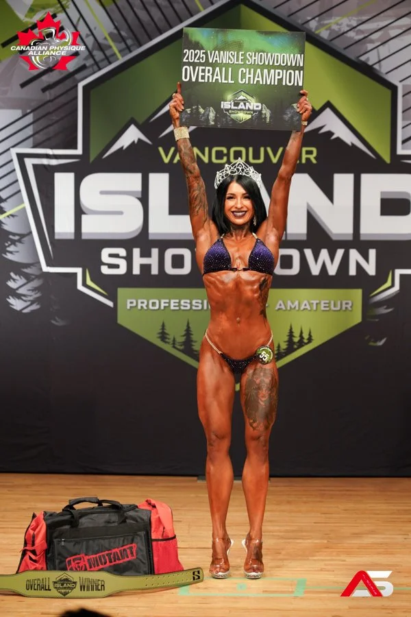 Laurie’s customers, Mariana and Carmen holding hands on a green lawn on their wedding day.