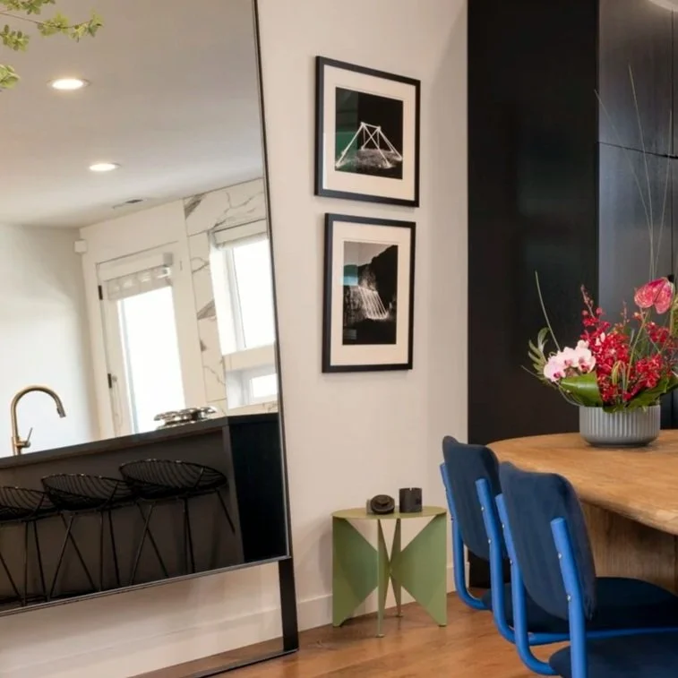 A pair of Levi Jackson editioned prints, 'Presence Tent' and 'Shelter' gifted to UMOCA gala attendees in 2020. 

A gorgeous butterfly stool from FandFVintage on Etsy, offers a colorful response to Levi's black and white style.