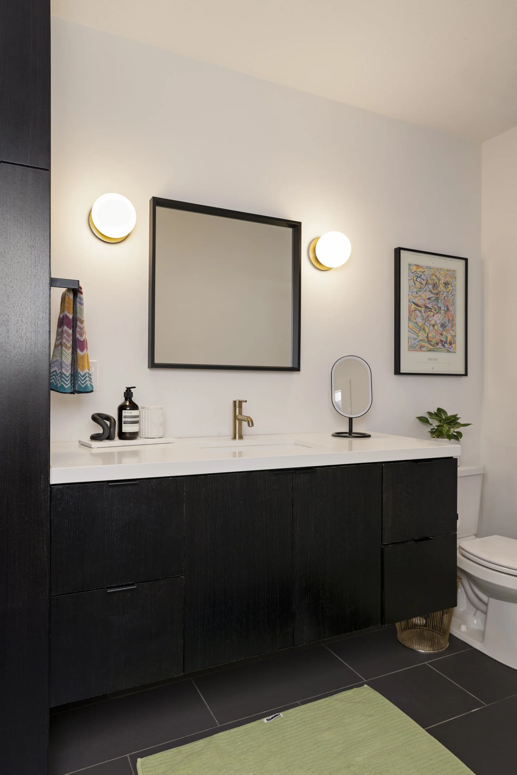 The en-suite bathroom is an ideal spot for your 'everything shower' offering ample space, a fancii smart makeup mirror, Aesop toiletries and sumptuous Hommey bath linens*. 