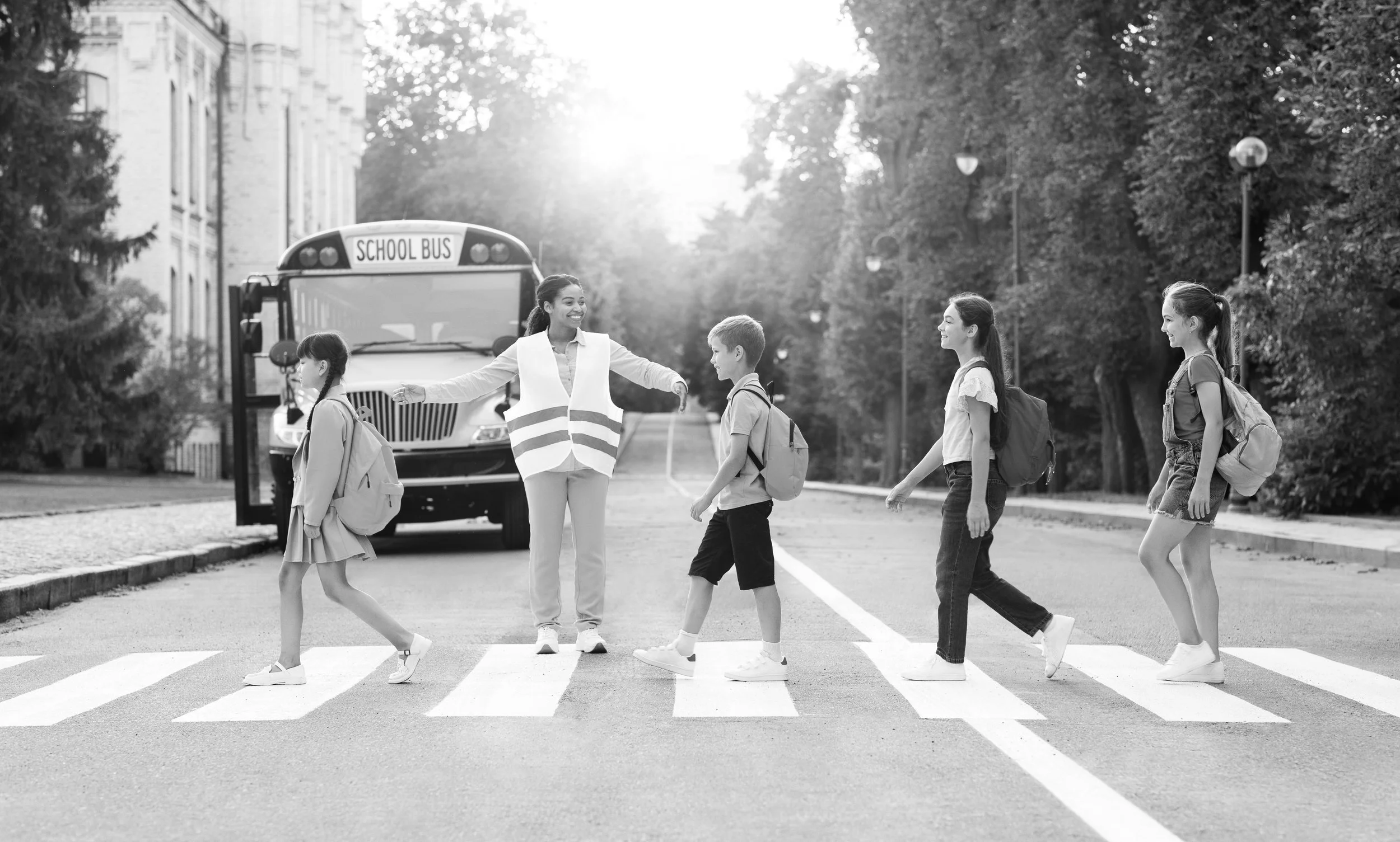 group-children-passing-crosswalk-infront-of-guard.jpg