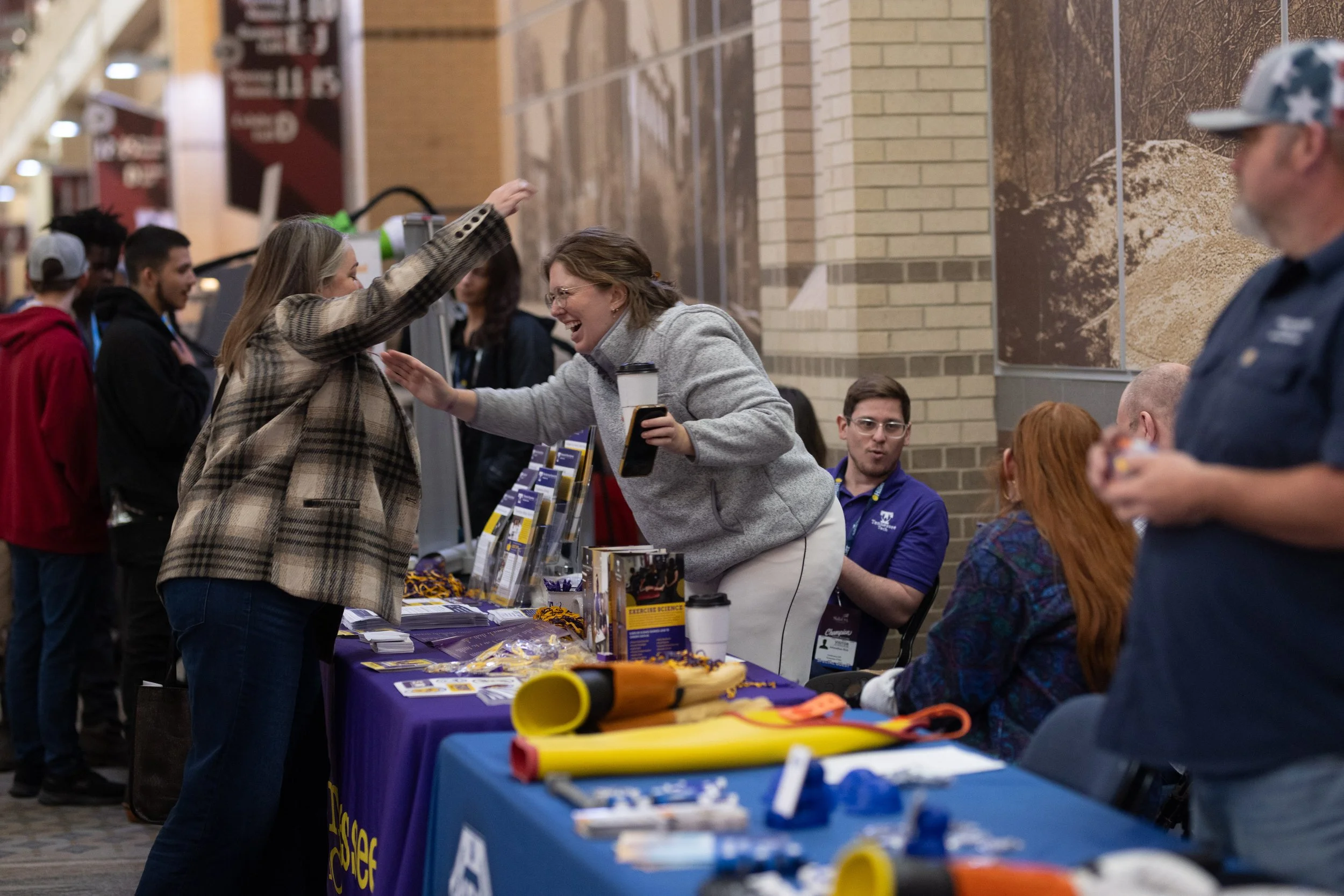 Conference attendees interact with a SkillsUSA Partner to learn more about them.