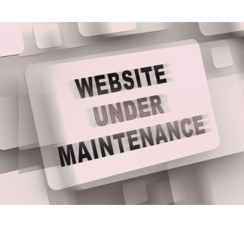 Computer keyboard with a pink overlay and a message saying "Website Under Maintenance" in bold letters.