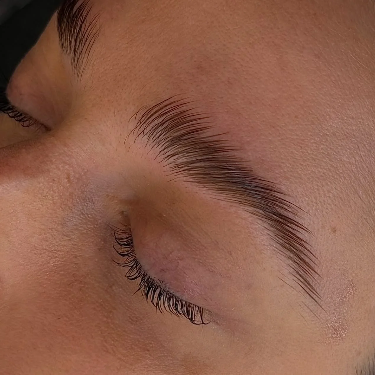 First step, and already doing the most ✨

Brow lamination starts by softening and restructuring the hair so we can redirect it into a fuller, lifted shape. This is where the magic begins&mdash;setting the foundation for that clean, brushed-up look wi